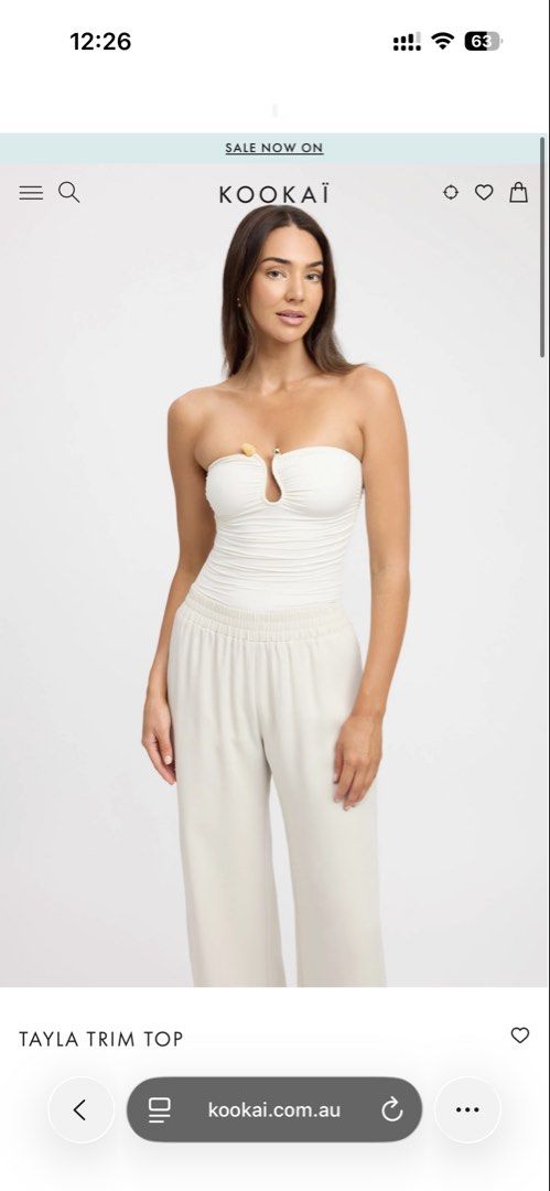 Kookai Tayla Tube Top (Category: Sleeveless) located in Quezon City. Submitted by yippeegirl (Listing ID 1462074316, Image 2). Description: - Kookai tayla black ruched tube top - Features a cut-out with gold and stone embellishments rfs: decluttering reposting as i accidentally marked sold the og listing !.