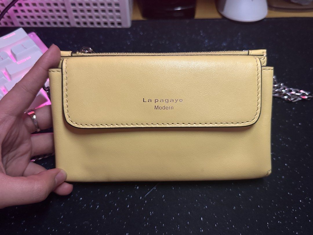 La Pagayo Wallet/ Phone sling (Category: Wallets & Card holders) located in San Pedro. Submitted by shopbykmori (Listing ID 1462253463, Image 1). Description: La Pagayo Modern (European brand) Wallet/ Phone Sling/ Card Holder.