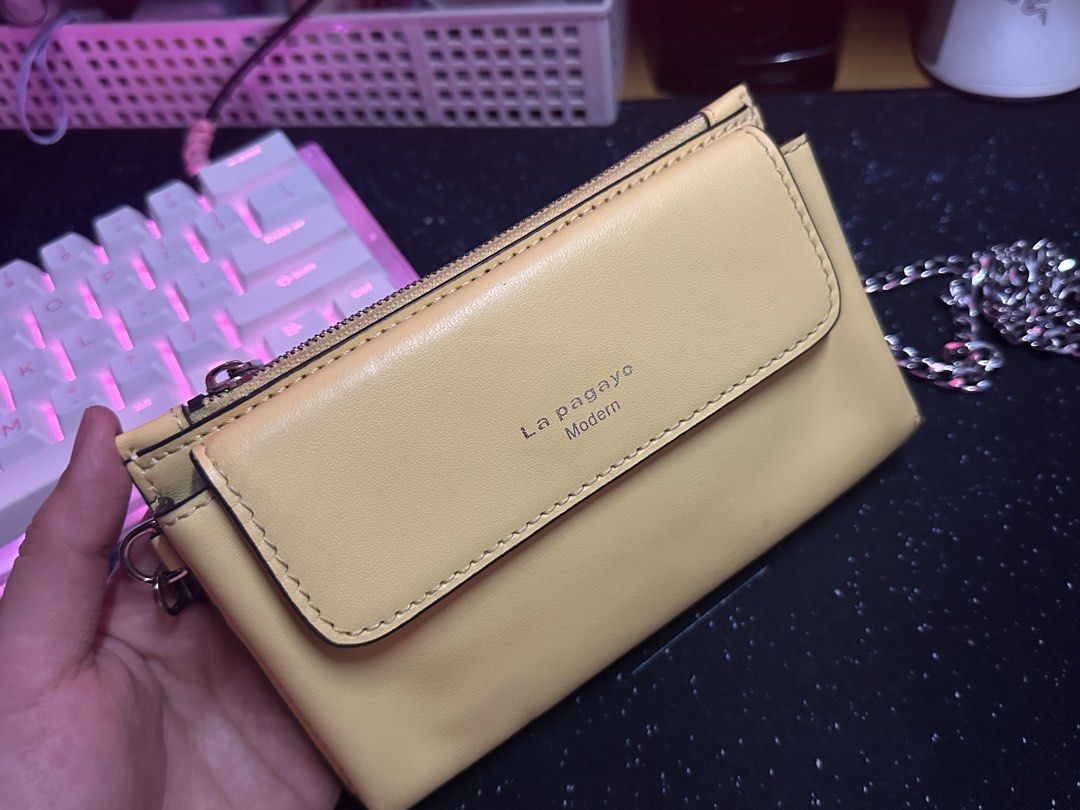 La Pagayo Wallet/ Phone sling (Category: Wallets & Card holders) located in San Pedro. Submitted by shopbykmori (Listing ID 1462253463, Image 2). Description: La Pagayo Modern (European brand) Wallet/ Phone Sling/ Card Holder.
