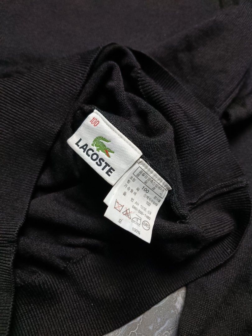 Lacoste Black Turtleneck Sweater Size 100 (Category: Coats, Jackets and Outerwear) located in Valenzuela. Submitted by 2ndhandmarket.ph (Listing ID 1462131719, Image 3). Description: - Classic black turtleneck sweater - Iconic Lacoste crocodile logo embroidered on chest - Comfortable knit material - Tag size: 100 - Versatile for layering or standalone wear Width: 19 Length: 26.5 No issues Excellent conditions.