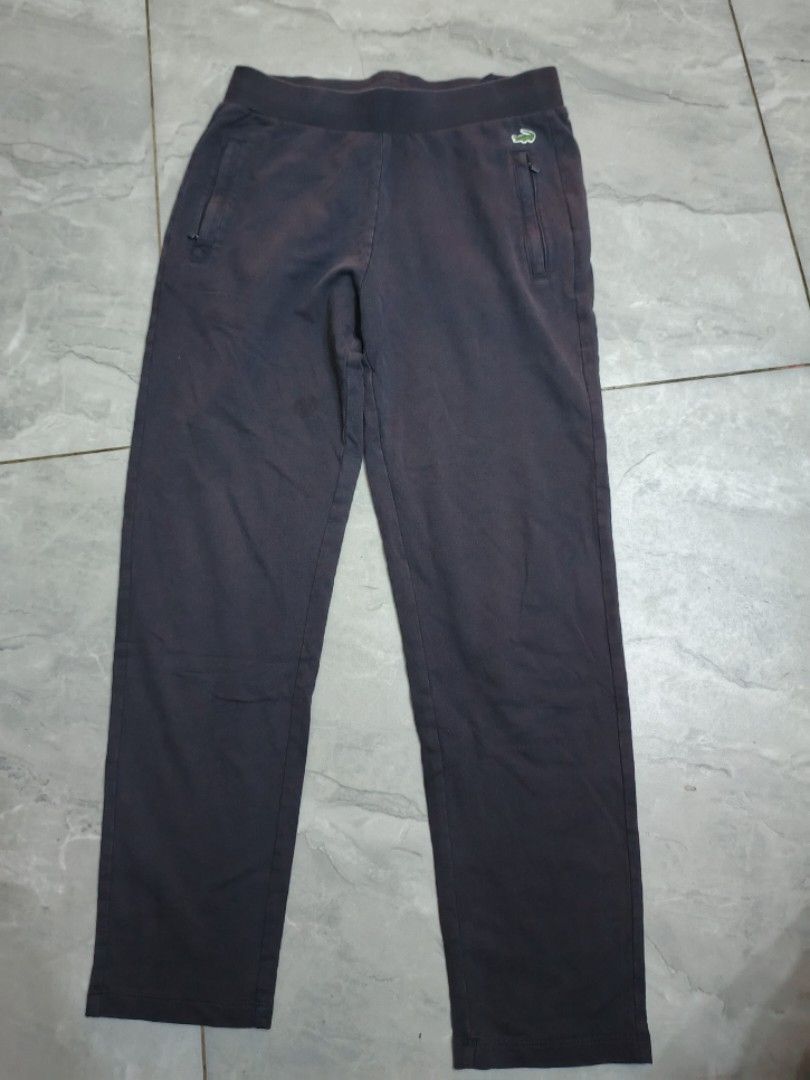 Lacoste Cartelo Sweatpants Size M (Category: Other Bottoms) located in Bulacan. Submitted by gratsy (Listing ID 1462049252, Image 1). Description: Lacoste Cartelo. Elastic waistband with drawstring. Two zippered pockets on the front. Small embroidered crocodile logo on the right pocket. Size M (160/68A). Made of 100% cotton. gift lang sa anak ko..