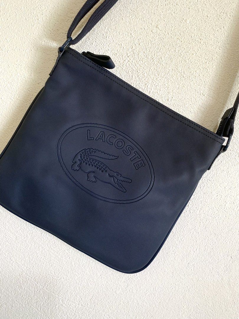Lacoste Flat Crossover Crossbody Bag (Category: Sling Bags) located in Goa. Submitted by dandd_thrift_goods (Listing ID 1462119839, Image 3). Description: ▪️Issue: Crack leather lining sa loob & Need Wash.
