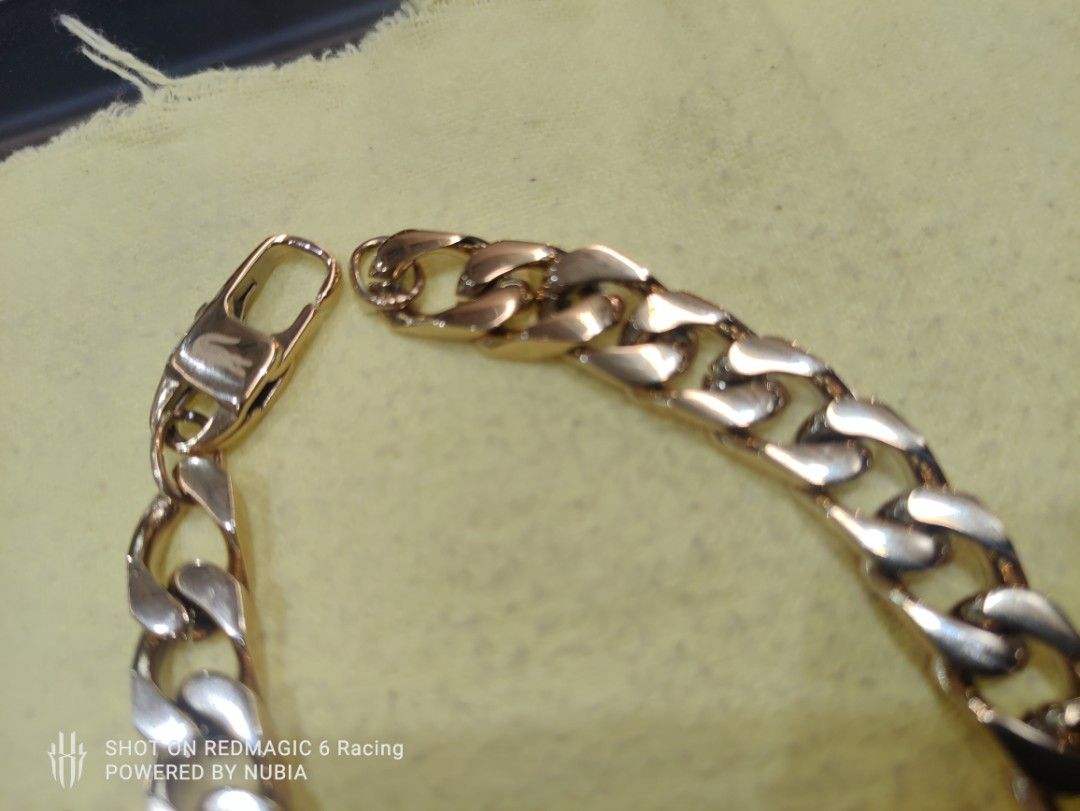 Lacoste Gold Chain Necklace (Category: Necklaces) located in Manila. Submitted by alfredaguirre0819 (Listing ID 1462066496, Image 3). Description: - Authentic Lacoste gold chain and silver necklace - Features iconic crocodile logo on a plaque - Includes original box and tags - Purchased from Landers Superstore - A stylish and great accessory 20k neg location arca south taguig or pasay newport.