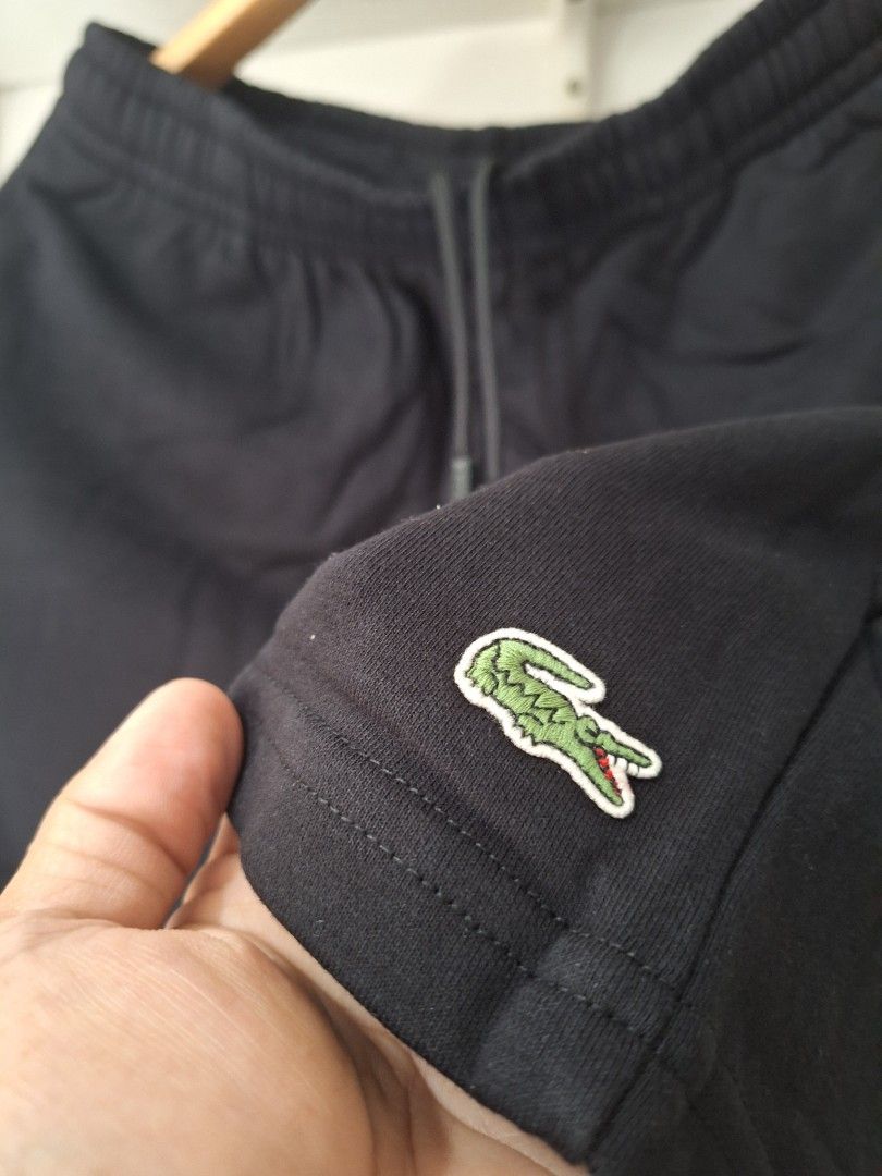 Lacoste jogger shorts black (Category: Shorts) located in Muntinlupa City. Submitted by kstefanomela14 (Listing ID 1462086315, Image 2). Description: lacoste jogger shortts black length - 19 inches waistline: small - 30 to 32 cod cop lalamove lbc j&t.