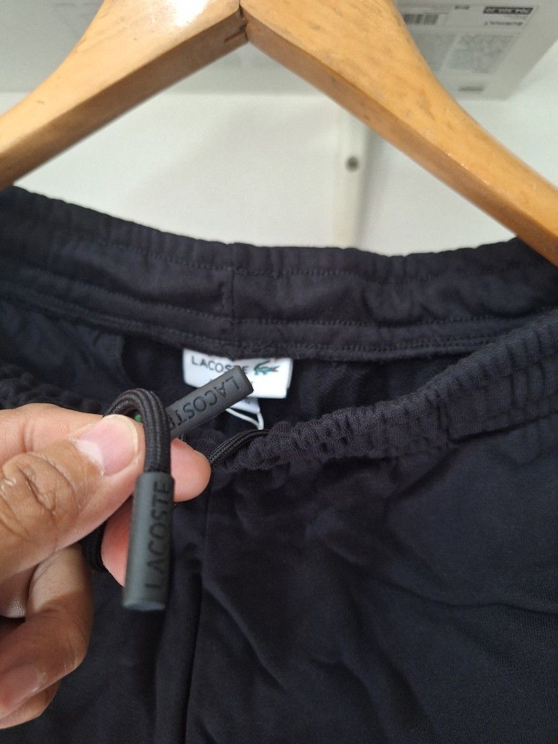 Lacoste jogger shorts black (Category: Shorts) located in Muntinlupa City. Submitted by kstefanomela14 (Listing ID 1462086315, Image 3). Description: lacoste jogger shortts black length - 19 inches waistline: small - 30 to 32 cod cop lalamove lbc j&t.