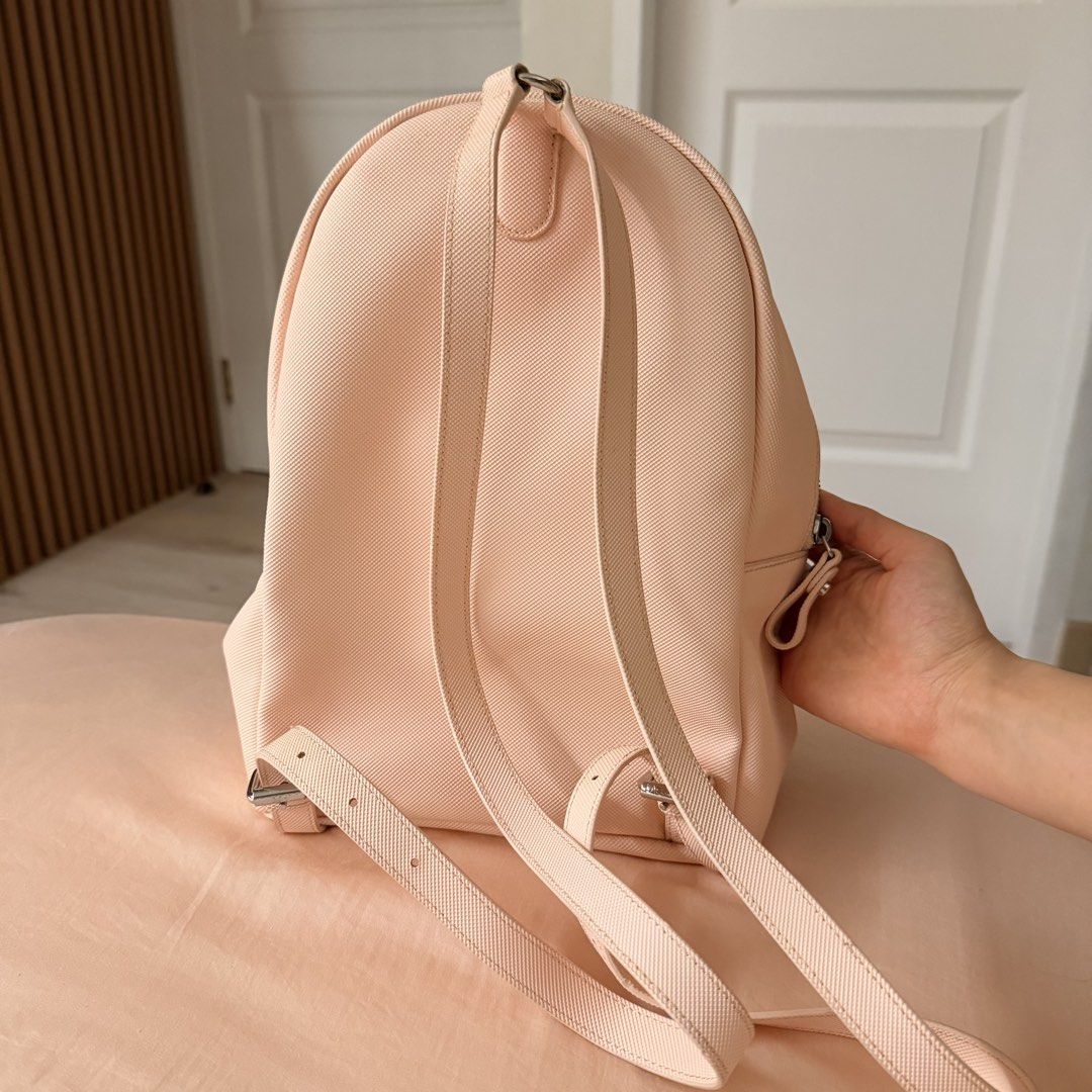 lacoste pink backpack (Category: Backpacks) located in Angeles City. Submitted by alexandramhaey (Listing ID 1462149570, Image 2). Description: very girly 🤍 still in excellent condition with no flaws :) only kept in my closet and rarely used no inclusions, bag only. super cute and looks even nicer in person :).