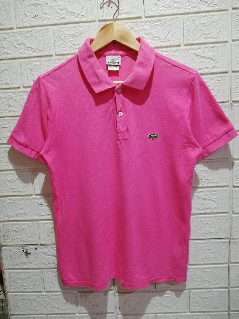 Lacoste Pink Polo Shirt (Category: Tshirts & Polo Shirts ) located in Rizal. Submitted by tiangarcia02 (Listing ID 1462173548, Image 1). Description: - Classic pink Lacoste polo shirt - Iconic crocodile logo on chest - Made in Peru - 100% cotton fabric - Comfortable and breathable - Ideal for casual or sporty outfits.
