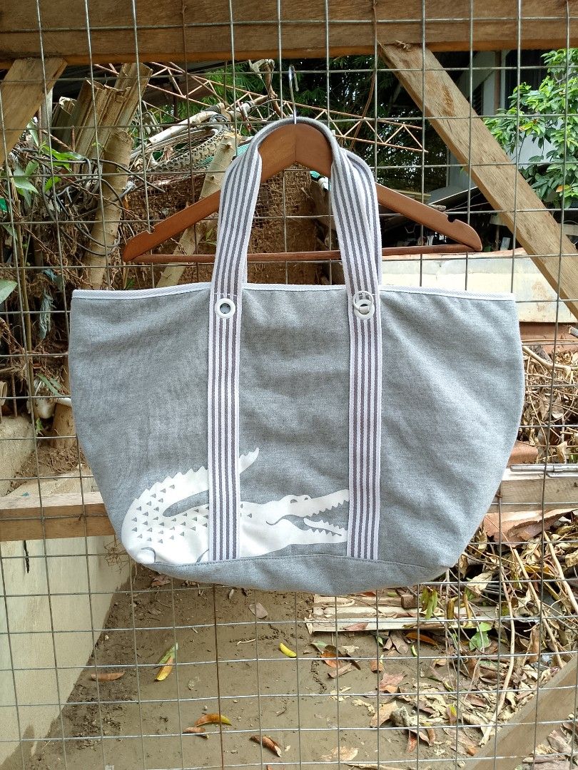 LACOSTE TOTE BAG (Category: Tote Bags) located in Iligan City. Submitted by norodinmur83041 (Listing ID 1462090506, Image 1). Description: LACOSTE TOTE BAG BIG LOGO ASNEW CONDITION NEED WASH.