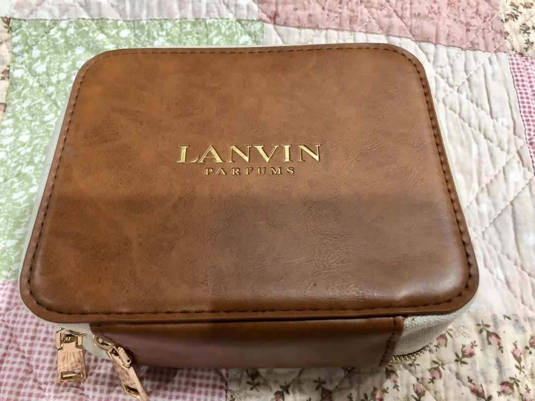 Lanvin Cosmetic Pouch (Category: Accessory Holder, Box & Organizers) located in Quezon City. Submitted by sheisdecluttering_now (Listing ID 1462075273, Image 1). Description: from Turkish Airlines combination of leather and canvass .