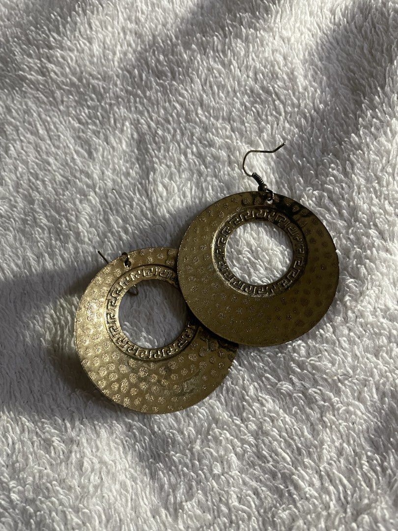 Dangling Earrings (Category: Earrings) located in Bulacan. Submitted by keytxcx (Listing ID 1462185573, Image 2). Description: Dangling Earrings - Large, round statement earrings - Unique hammered texture all over - Elegant patterned border detail - Beautiful brassy/antique gold metal tone - Hangs from simple, comfortable ear wires - Versatile: Elevates any outfit! - Price is still negotiable!!! - With freebies - Rfs: decluttering - Dm me for mor