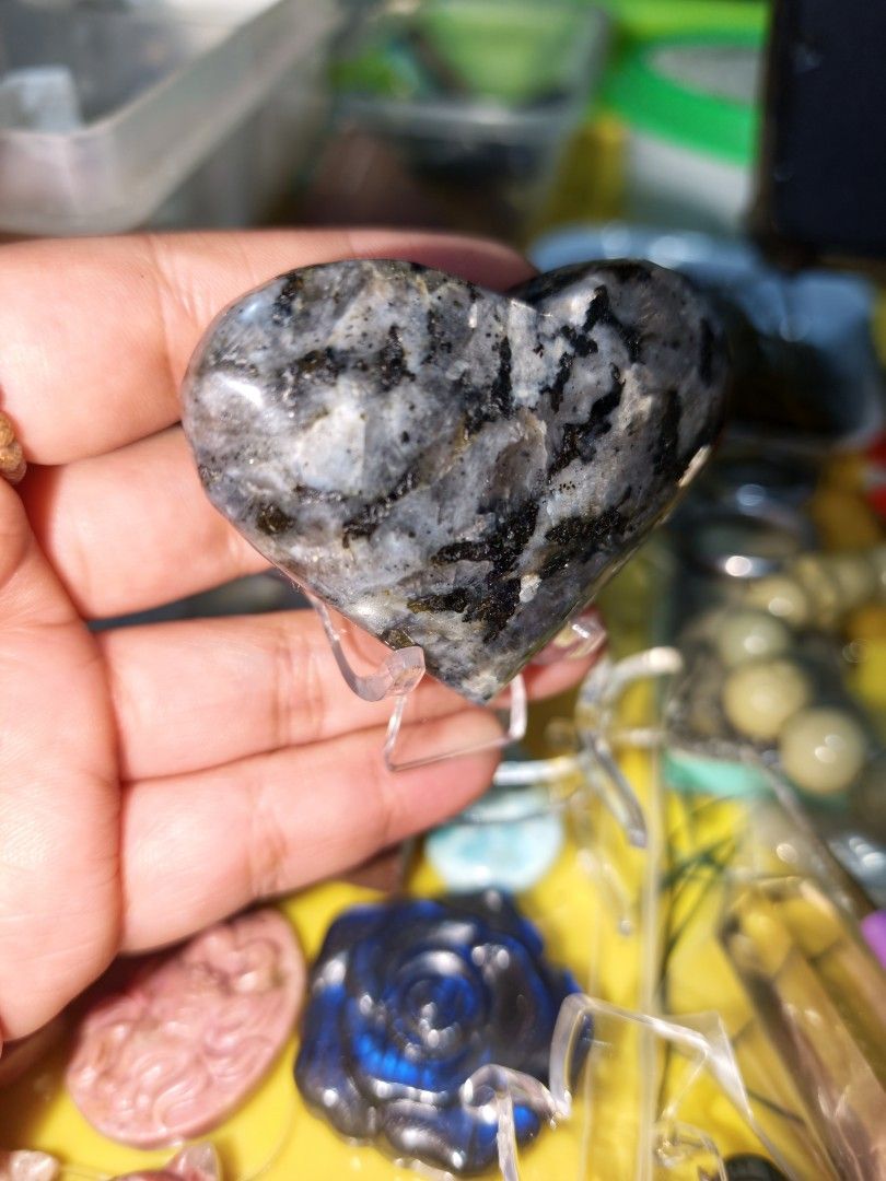 Larvikite Heart Carving Natural Crystal Stone (Category: Precious Stones) located in Quezon City. Submitted by piaoliangcollections.ph (Listing ID 1462223362, Image 2). Description: Larvikite is a dark igneous rock with a silver-blue shimmer that crystal practitioners value for grounding, mental focus, and energetic protection.