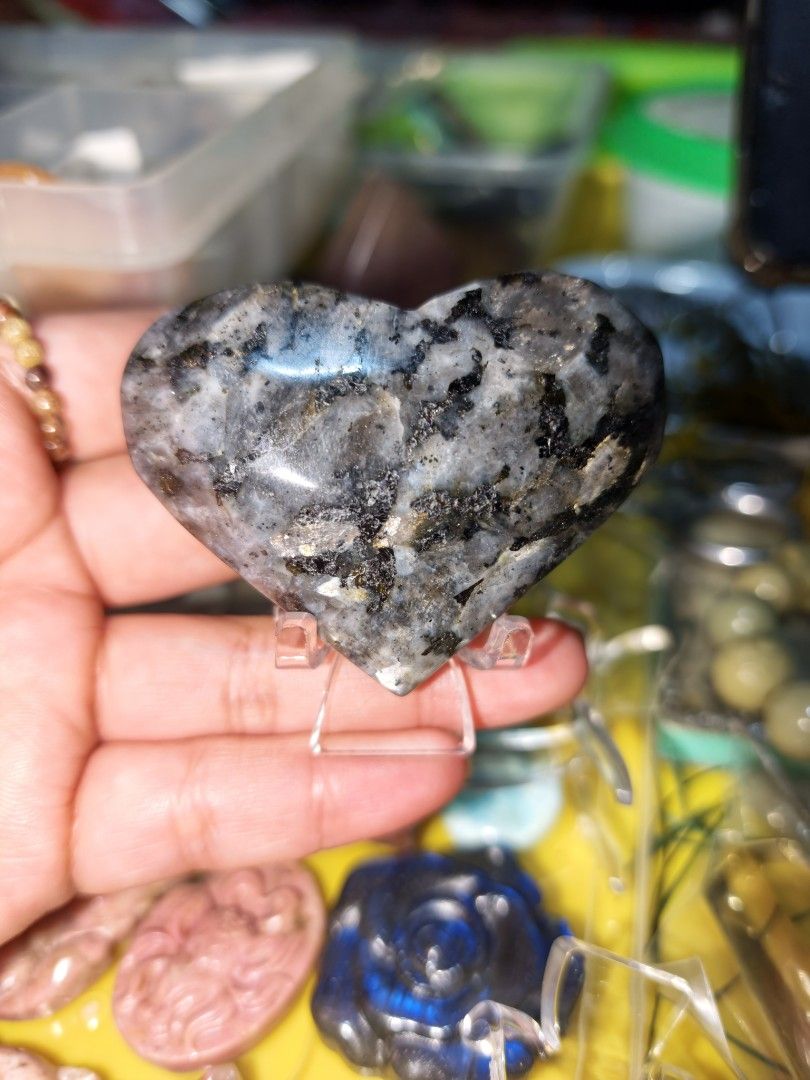 Larvikite Heart Carving Natural Crystal Stone (Category: Precious Stones) located in Quezon City. Submitted by piaoliangcollections.ph (Listing ID 1462223362, Image 3). Description: Larvikite is a dark igneous rock with a silver-blue shimmer that crystal practitioners value for grounding, mental focus, and energetic protection.