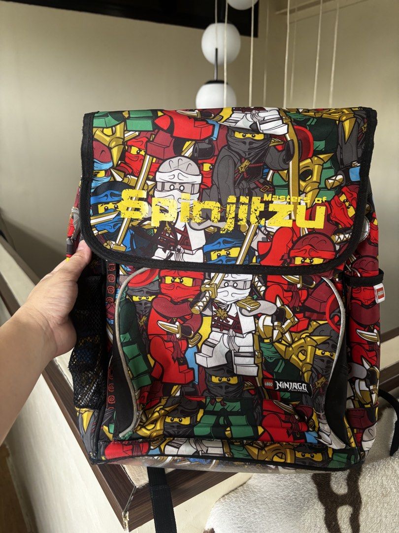 Lego Ninjago Backpack (Category: Babies & Kids Fashion) located in Quezon City. Submitted by dearbento.boutique (Listing ID 1462127972, Image 1). Description: Lego Ninjago Backpack Ganda nito. Ang daming books & notebooks ang kasya but not bulky itong bag na ‘to. .