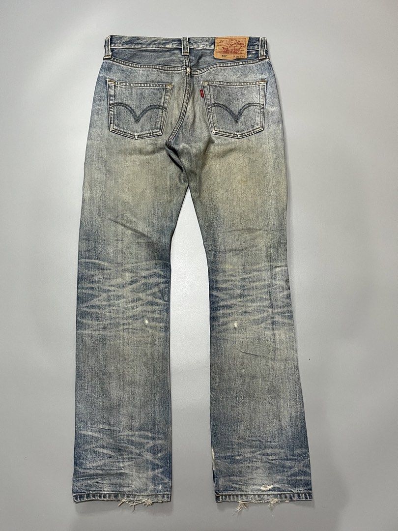 Levi's 501 Button Fly Distressed Denim Jeans (Category: Jeans) located in Manila. Submitted by jorgemabelin2001 (Listing ID 1462050786, Image 2). Description: - Classic Levi's 501 jeans - Light blue wash with intentional distressing and fading - Button fly closure - Rips and wear on knees and thighs - Frayed hem - Vintage/rugged aesthetic - Shows character from previous wear -Dimes 30x41.5 -Hem 7.5 .