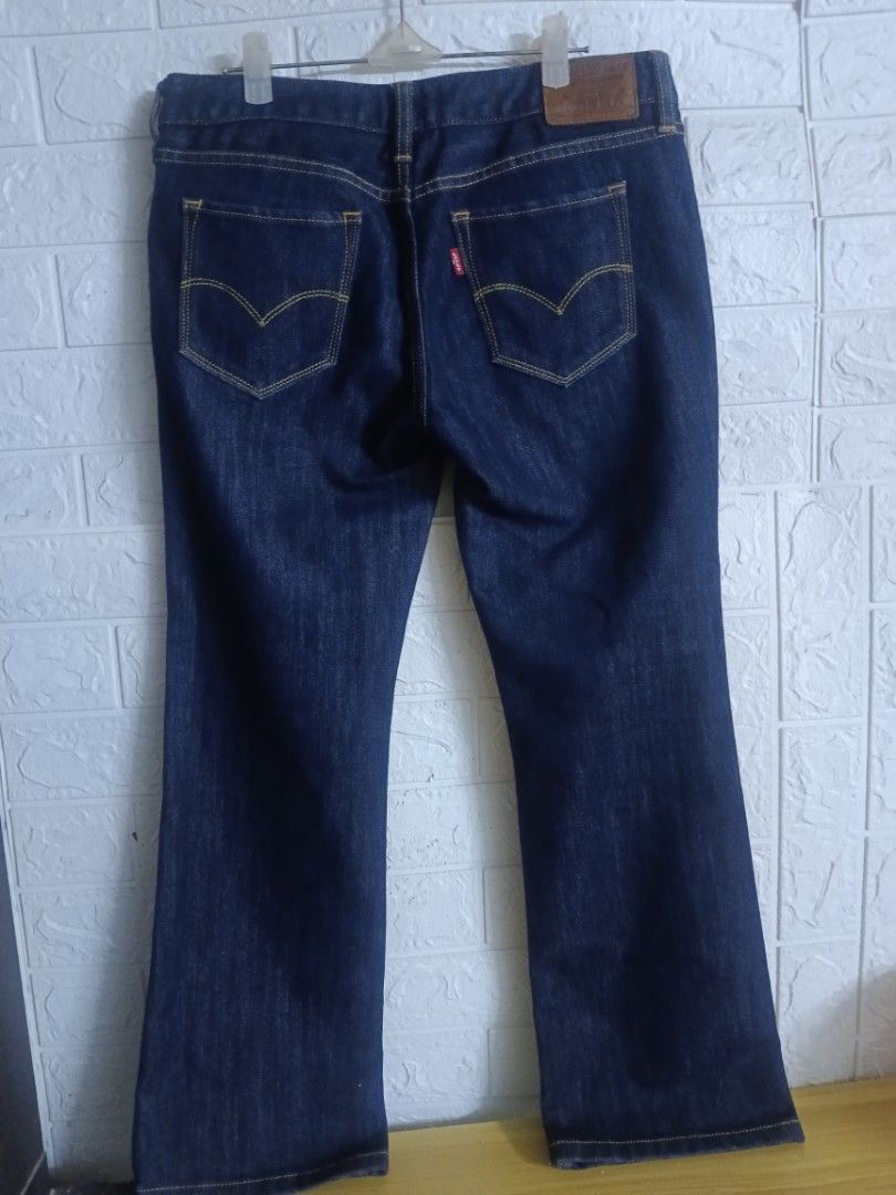 Levi's Bootcut Jeans - Size 28-29 (Category: Jeans) located in Digos. Submitted by chicandglowbargains (Listing ID 1462048179, Image 3). Description: - Classic Levi's bootcut jeans - Dark wash denim - Size: 28-29 waist, 32 inches length - Quality, durable denim material - Versatile for everyday wear - Timeless, classic style - Button and zip fly closure.