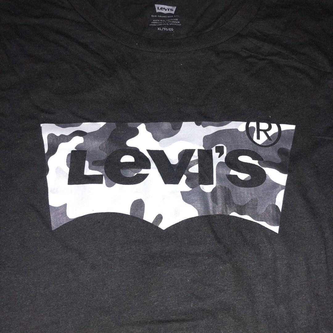Levi’s Camo Bat Wing Logo Tee Black (Category: Tshirts & Polo Shirts ) located in Biliran. Submitted by thrift_lane101 (Listing ID 1462177014, Image 3). Description: Size Xl 23.5x29.5 Very good condition Cr 9.5 Issue minor loose stitch sa hem mga 2inchs Overall very good condition No cracks print Need wash Loc. Visayas .