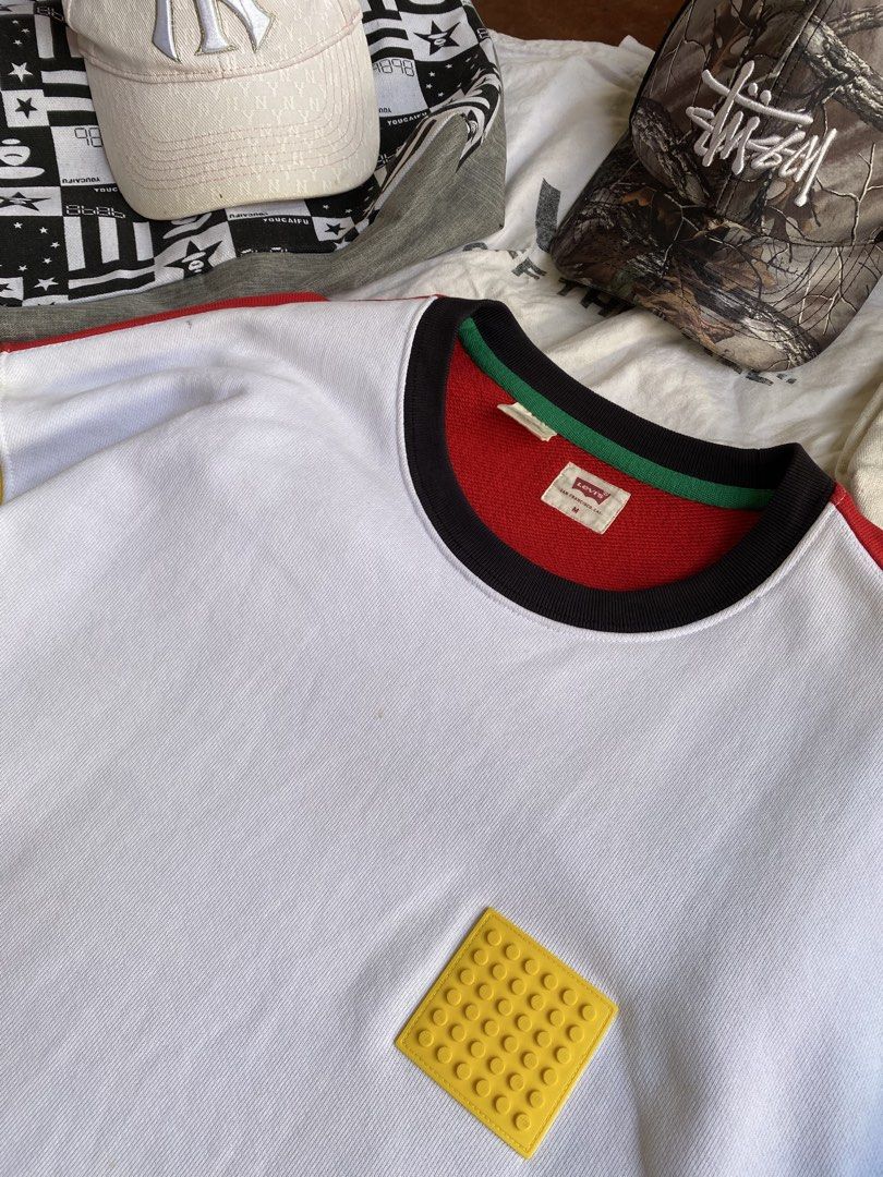 Levi's x LEGO Colorblock Sweatshirt (Category: Coats, Jackets and Outerwear) located in Manila. Submitted by thriftfindnicarl (Listing ID 1462048261, Image 2). Description: - Authentic Levi's x LEGO collaboration sweatshirt. - Eye-catching colorblock design: white body with vibrant yellow, blue, and red sleeves. - Subtle yet cool LEGO brick detail embroidered on the chest. - Comfortable ribbed cuffs and hem for a snug fit. - Ideal for everyday ca