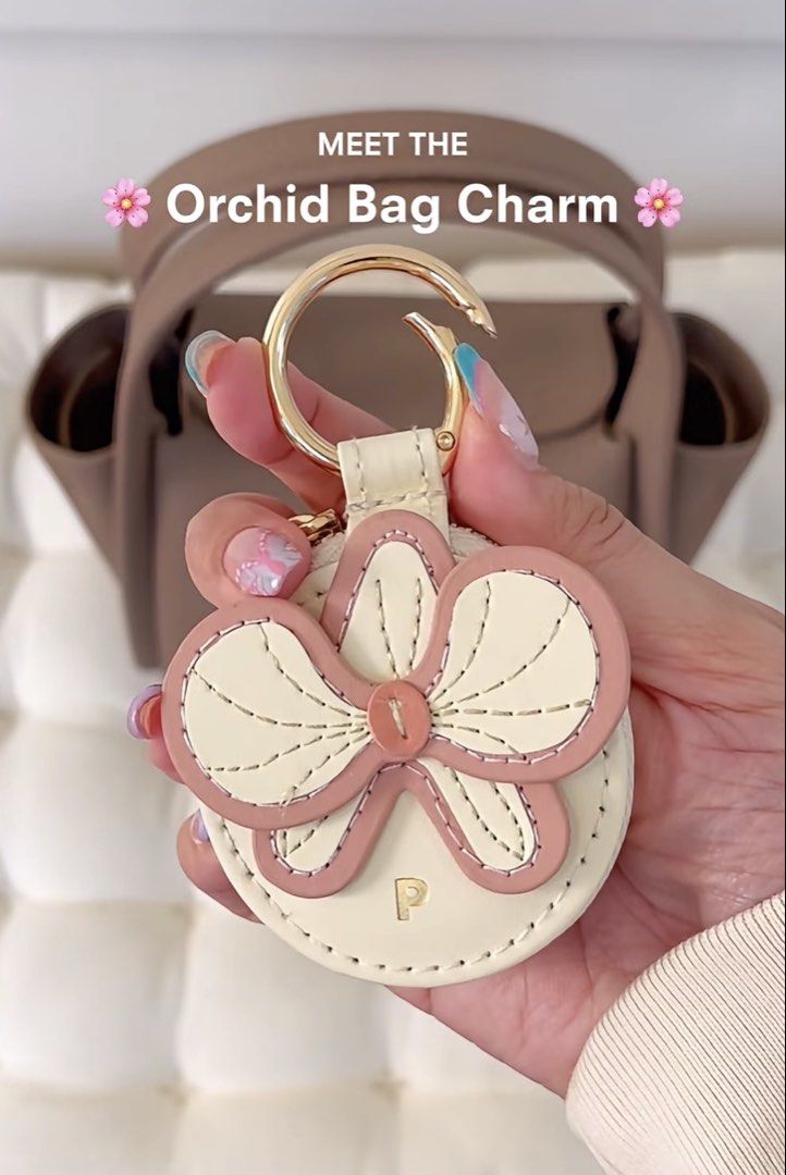 LF: Penny Pairs Orchid Bag Charm (Category: Charms) located in San Carlos. Submitted by sherbet___ (Listing ID 1462166246, Image 2). Description: I’m looking for this orchid charm from Penny Pairs. Kindly message me if you have one!.