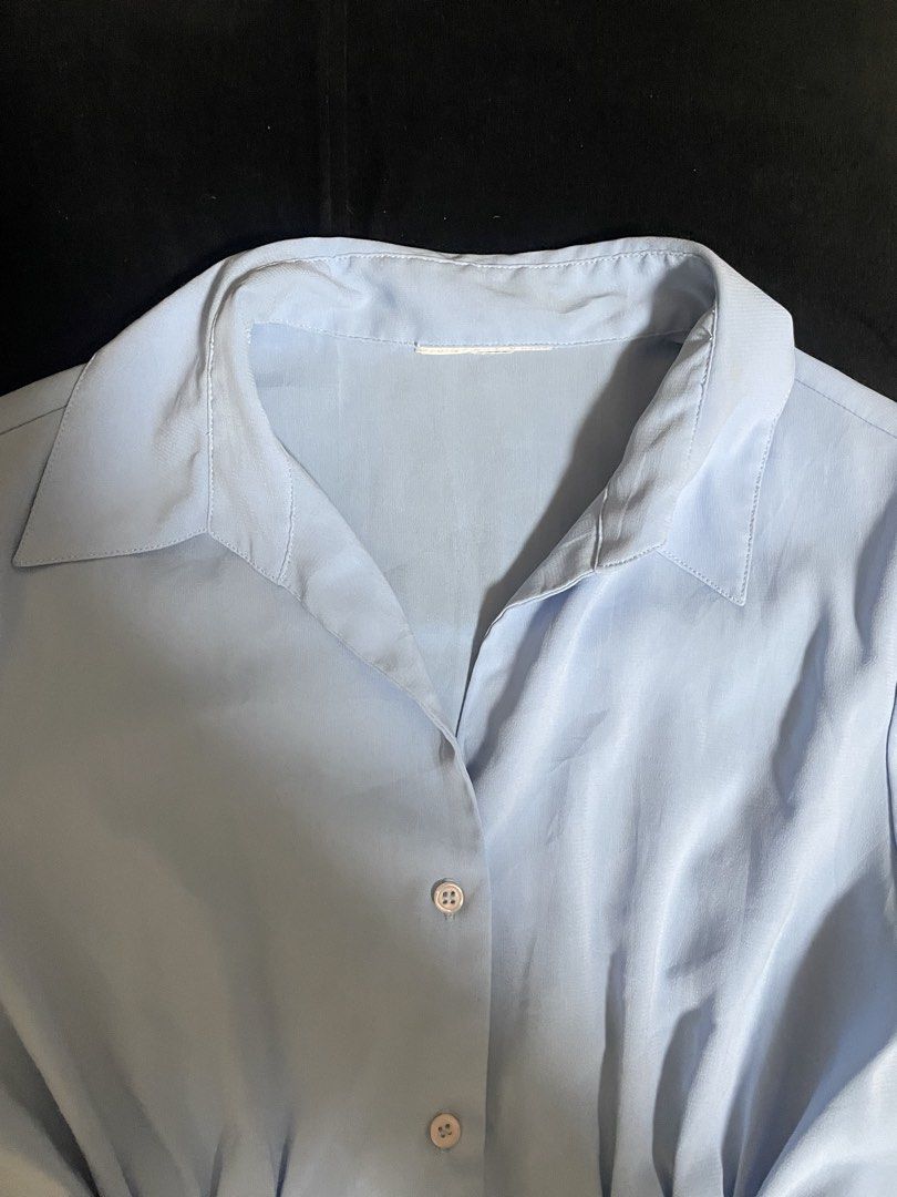 Light Blue Short Sleeve Collared Button Up Blouse Formal Top Preloved (Category: Blouses) located in San Juan, La Union. Submitted by nicaaas (Listing ID 1462126822, Image 3). Description: no issues laid flat measurements: waist: 17.5 inches length: 20.5 inches arm: 6.5 inches - Light blue short sleeve blouse - Collared neckline with button-up front - Fitted waist with dart details - Simple and classic design - Versatile for work or casual wear -