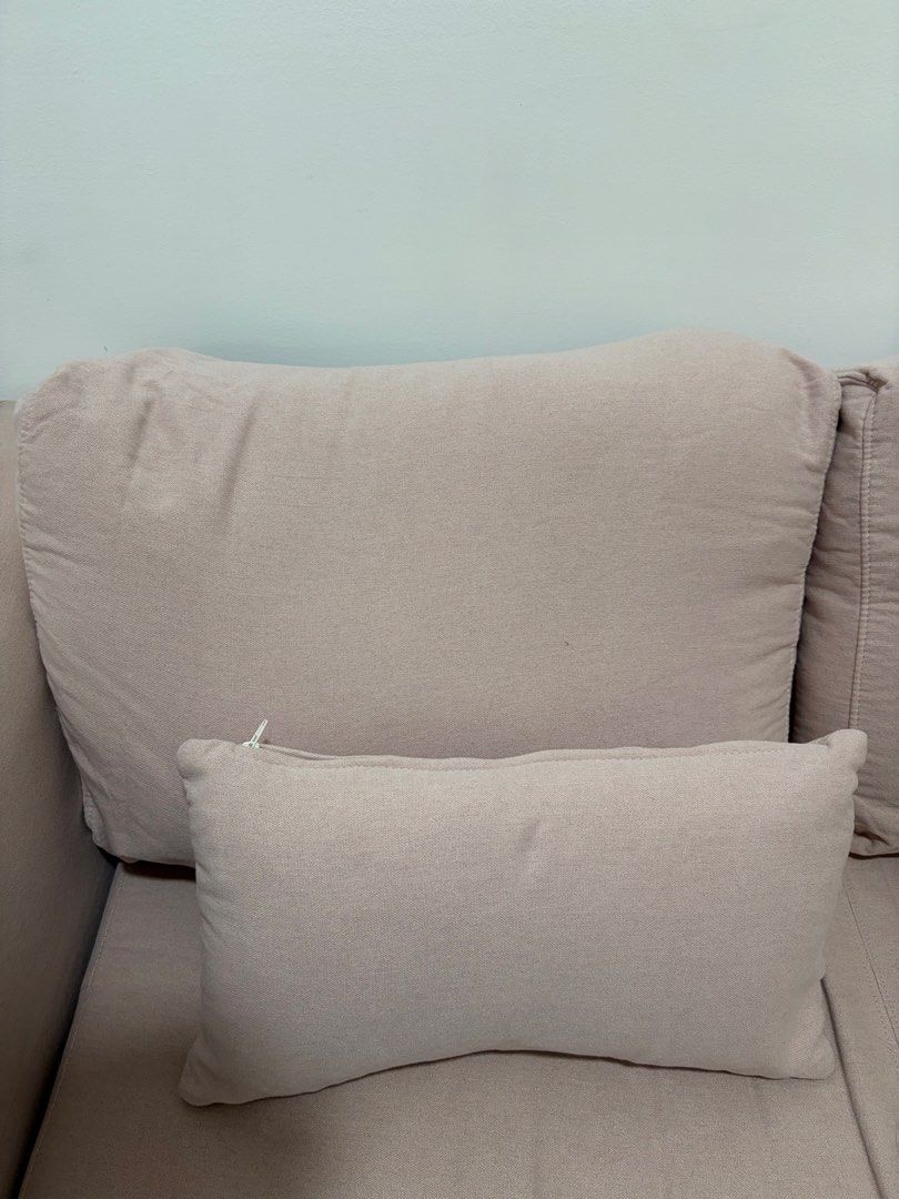 Light Pink Sofa Bed with Pillows (Category: Sofas) located in Mandaluyong City. Submitted by getbounced (Listing ID 1462087227, Image 2). Description: - Light pink sofa bed - Comfortable couch that converts to a bed - Includes 2 large back cushions - Includes 2 smaller accent pillows - Perfect for small spaces or guest rooms - Easy to convert from sofa to bed - Sofa Length: 147 cm Sofa Width: 71 cm Sofa Height: 77 cm Bed Width: 120 cm Bed Length: