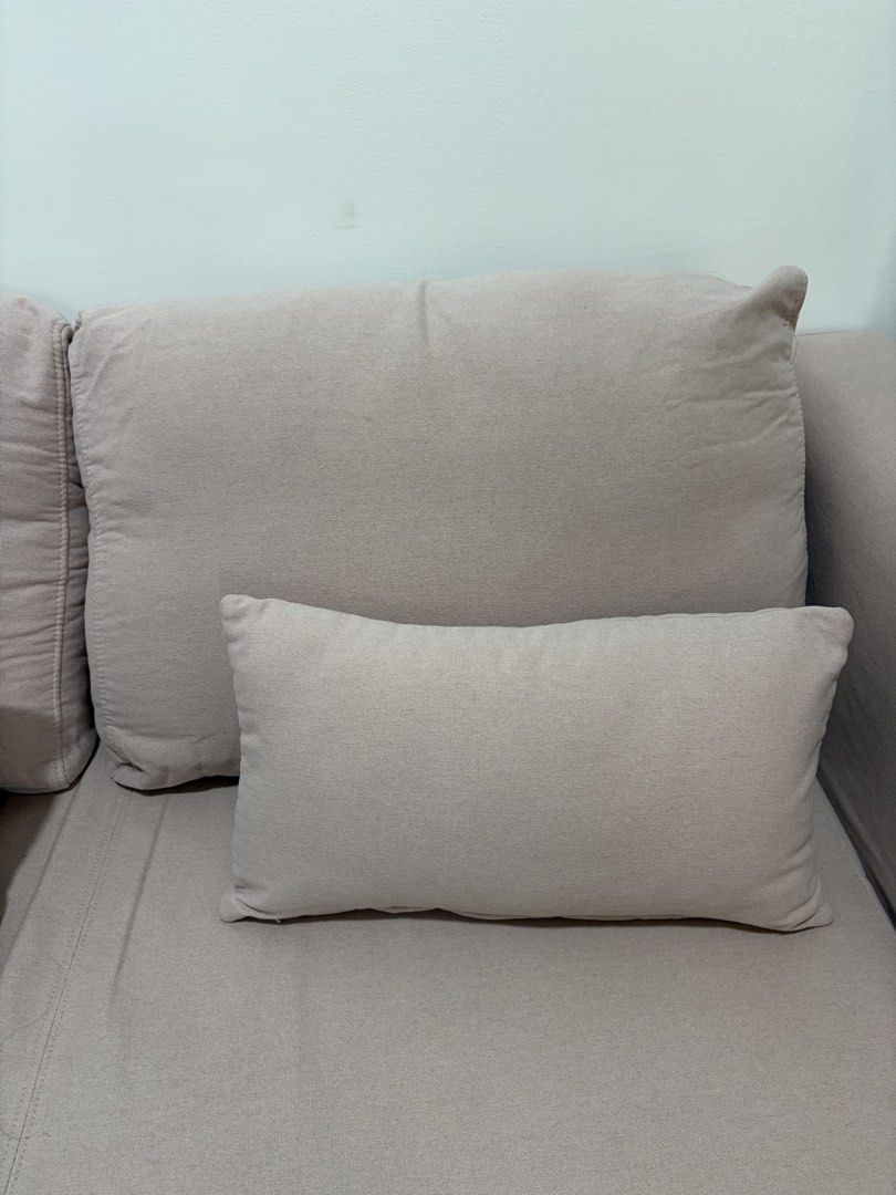 Light Pink Sofa Bed with Pillows (Category: Sofas) located in Mandaluyong City. Submitted by getbounced (Listing ID 1462087227, Image 3). Description: - Light pink sofa bed - Comfortable couch that converts to a bed - Includes 2 large back cushions - Includes 2 smaller accent pillows - Perfect for small spaces or guest rooms - Easy to convert from sofa to bed - Sofa Length: 147 cm Sofa Width: 71 cm Sofa Height: 77 cm Bed Width: 120 cm Bed Length: