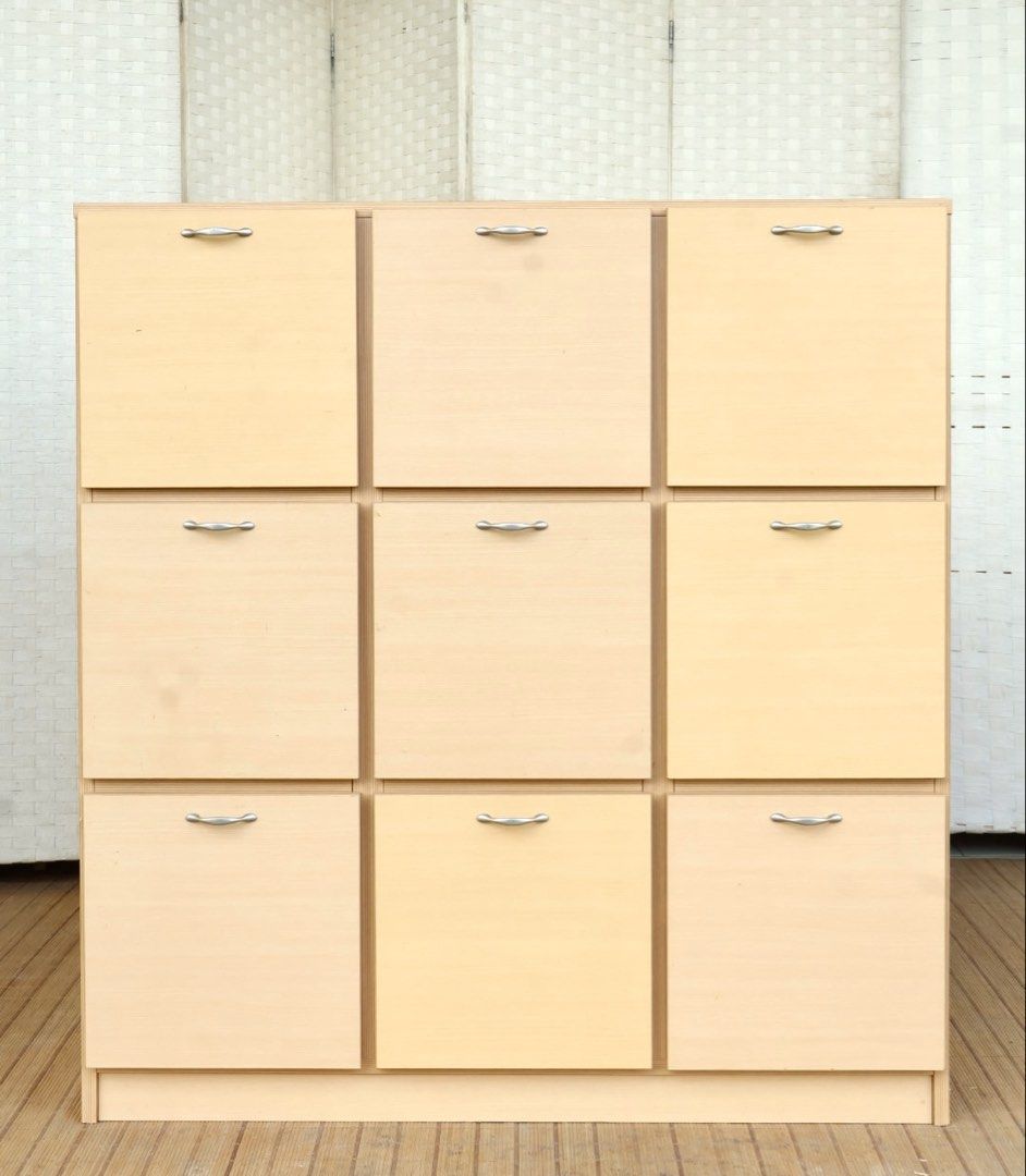 Light Wood 9-Drawer Storage Cabinet Organizer (Category: Shelves, Cabinets & Racks) located in Bulacan. Submitted by FurnitureGallery (Listing ID 1462257401, Image 1). Description: - Light wood finish - 9 drawers in a 3x3 grid - Smooth sliding drawer mechanism - Ideal for organizing shoes, clothes, or various items JAPAN SURPLUS FURNITURE "SATO" MODERN DESIGN LATERAL DRAWER WITH 9PULLOUT DRAWERS Size 44L x 15.5W x 46.76H in inches (AS-IS ITEM) *M