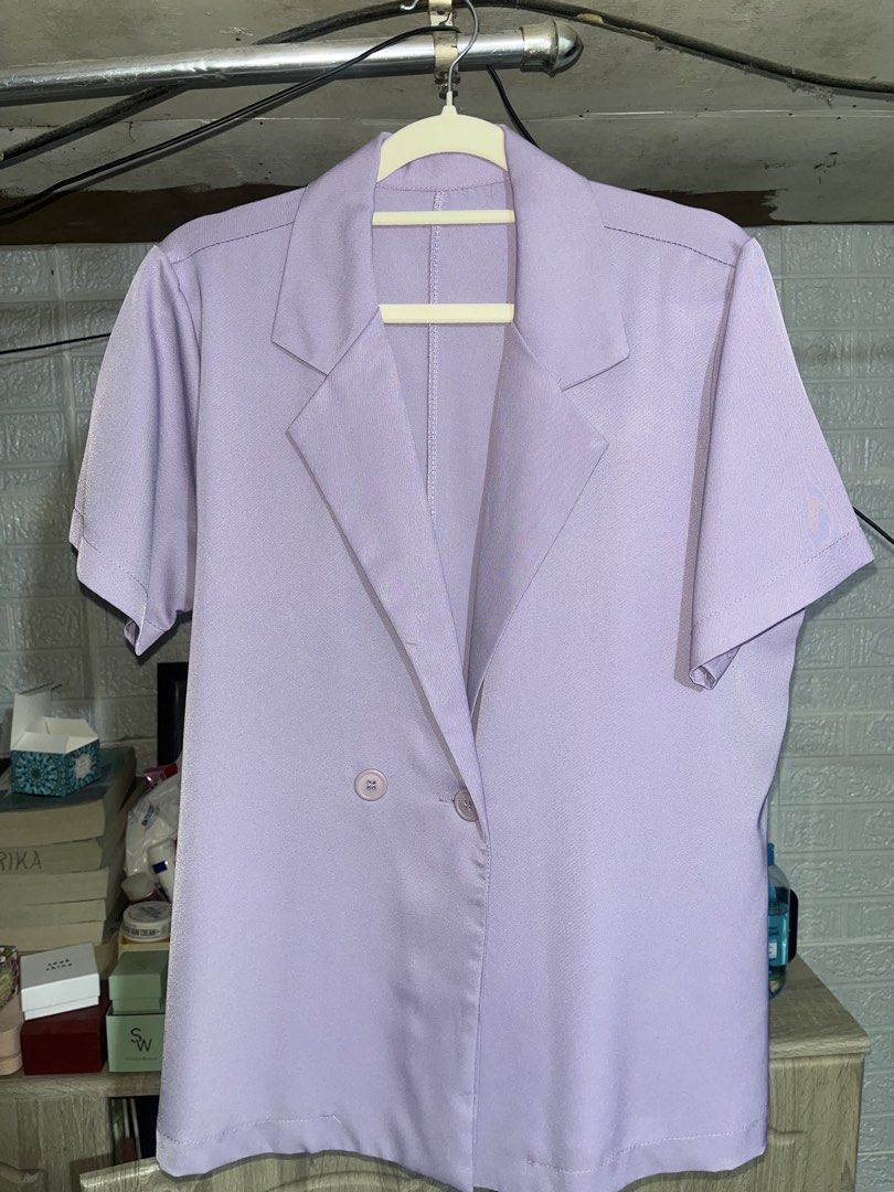 Lightweight Short Sleeve Button-Up Blouse and Blazer (Category: Blouses) located in Quezon City. Submitted by akikekoku (Listing ID 1462201406, Image 3). Description: - Set of 2 lightweight tops - Nude satin-like button-up blouse: collared, short sleeves (M) - Lilac purple blazer-style top: collared, short sleeves, double-button closure (L) - Good for layering or wearing solo #Polo #Office #Buttondown #CoverUp.