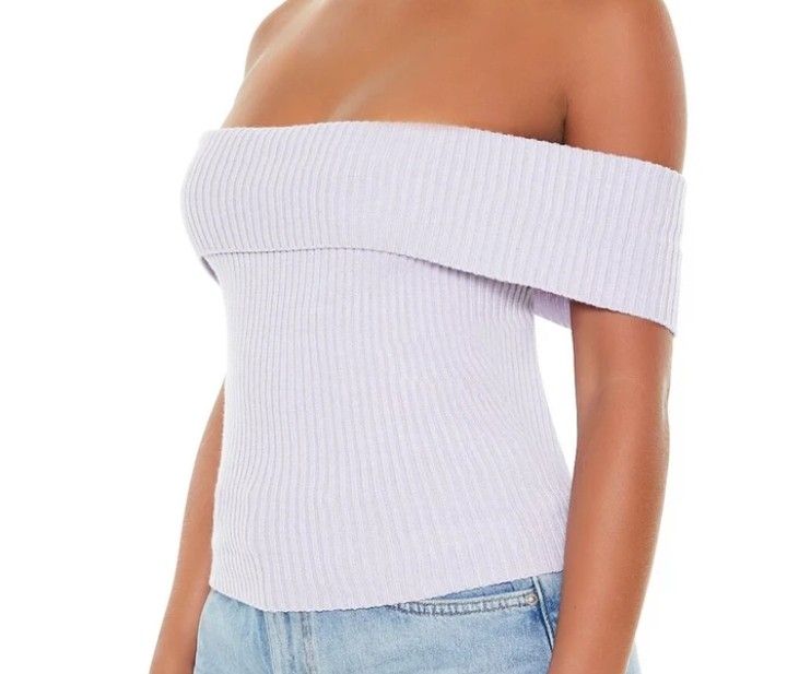Lilac Off-Shoulder Ribbed Knit Top with Bow Back (Category: Blouses) located in Manila. Submitted by zealfish_7401a9 (Listing ID 1462080706, Image 1). Description: - Super cute lilac color - Off-shoulder design - Ribbed knit material for a comfy fit - Adorable tie bow detail at the back - Pairs perfectly with jeans or skirts - Ideal for casual days or a night out.