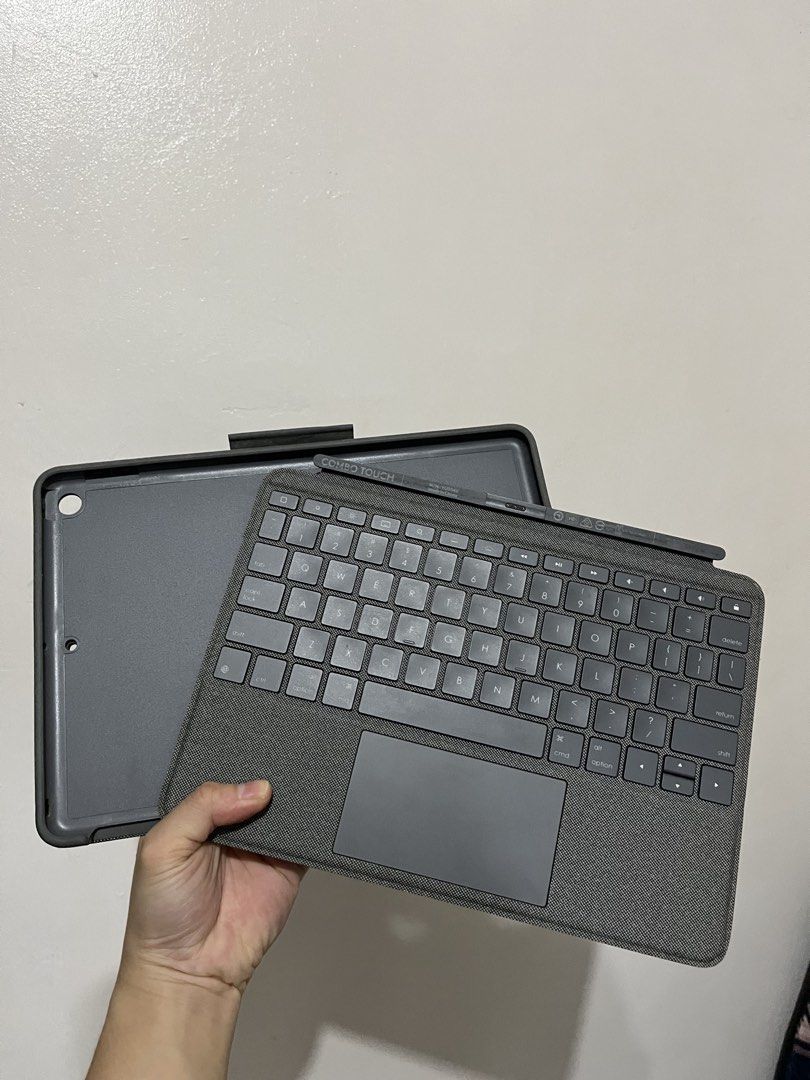 Logitech combo touch (Category: Cases & Sleeves) located in Manila. Submitted by madzv07 (Listing ID 1462087028, Image 2). Description: - Logitech Combo Touch Keyboard Case - Compatible with iPad (7th, 8th, & 9th gen) - Detachable keyboard design - Integrated trackpad for easy navigation - Adjustable backlit keys for comfortable typing - Smart Connector technology for instant connection (no pairing/charging) - Durable case for protection - Price 