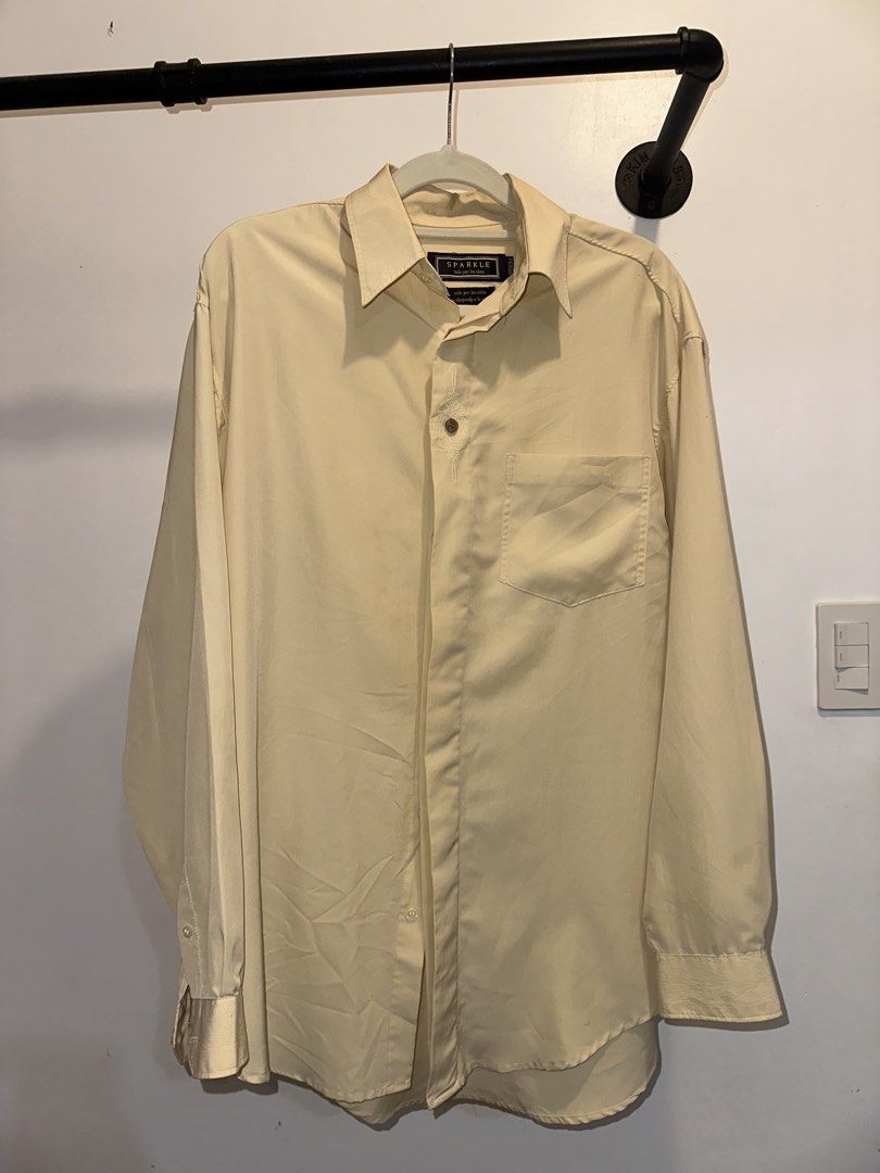 Long sleeves polo (Category: Formal Shirts) located in Taguig. Submitted by juansevie143 (Listing ID 1462178003, Image 1). Description: Long sleeves polo in Beige. Size medium. note: some buttons on the placket are hidden. Only one is shown..