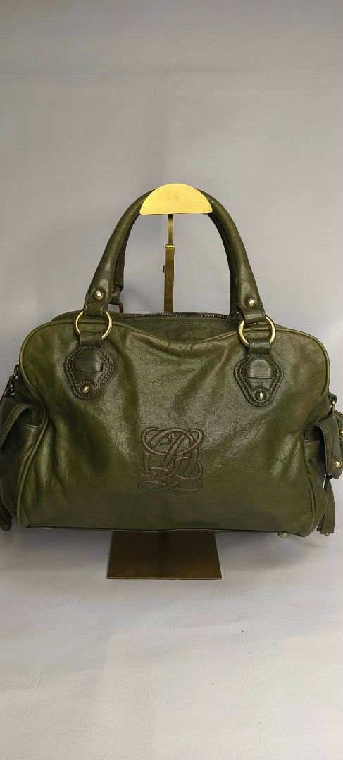 Louis Quatorze Leather Shoulder Bag (Category: Shoulder Bags) located in Baguio. Submitted by amagenbagsfashionshop (Listing ID 1462177514, Image 2). Description: Louis Quatorze Leather Shoulder Bag French Luxury Brand 🇫🇷 Crafted from genuine cowhide leather with refined detailing, perfect for everyday sophistication. Details: • Prominent embossed “LQ” monogram at the center • Double top handles • Gold-toned hardware rings • Functional side fla