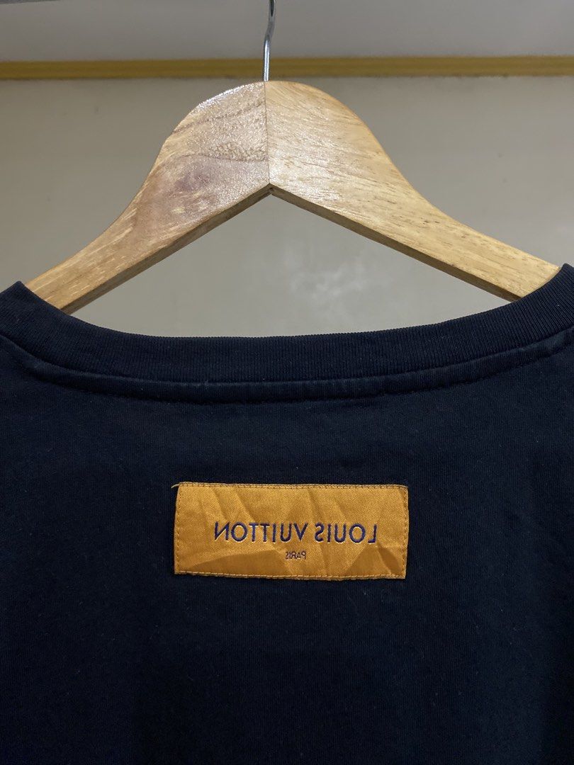 Louis Vuitton Black T-shirt (Category: Tshirts & Polo Shirts ) located in Rizal. Submitted by channzy (Listing ID 1462065392, Image 3). Description: - Black Louis Vuitton t-shirt - Features authentic Louis Vuitton Paris tag inside - Includes orange tag with reversed Louis Vuitton Paris text - Made with good quality fabric - A stylish addition to your wardrobe.
