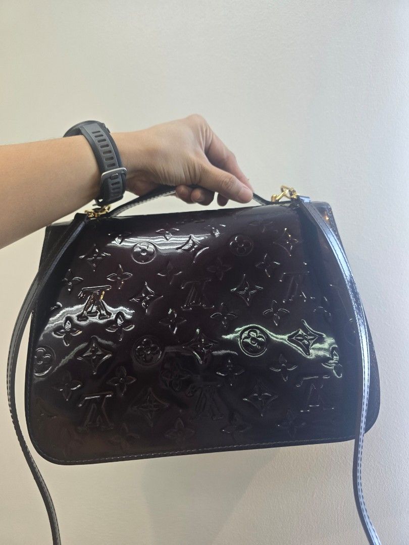 Louis Vuitton Mirada Amarante Monogram Vernis Bag (Category: Luxury Bags & Wallets) located in Taguig. Submitted by mluxeph (Listing ID 1462056151, Image 2). Description: Louis Vuitton Mirada Amarante Monogram Vernis Bag Material: Amarante coated Monogram embossed varnish calf leather Stamp: SR3161 Year: 2011 Interior: One open pocket and two main compartments Measurements: 10.4”L X 4.5”W X 7.75”H Handle Drop: 1" Hardware: Gold tone Inclusions: O