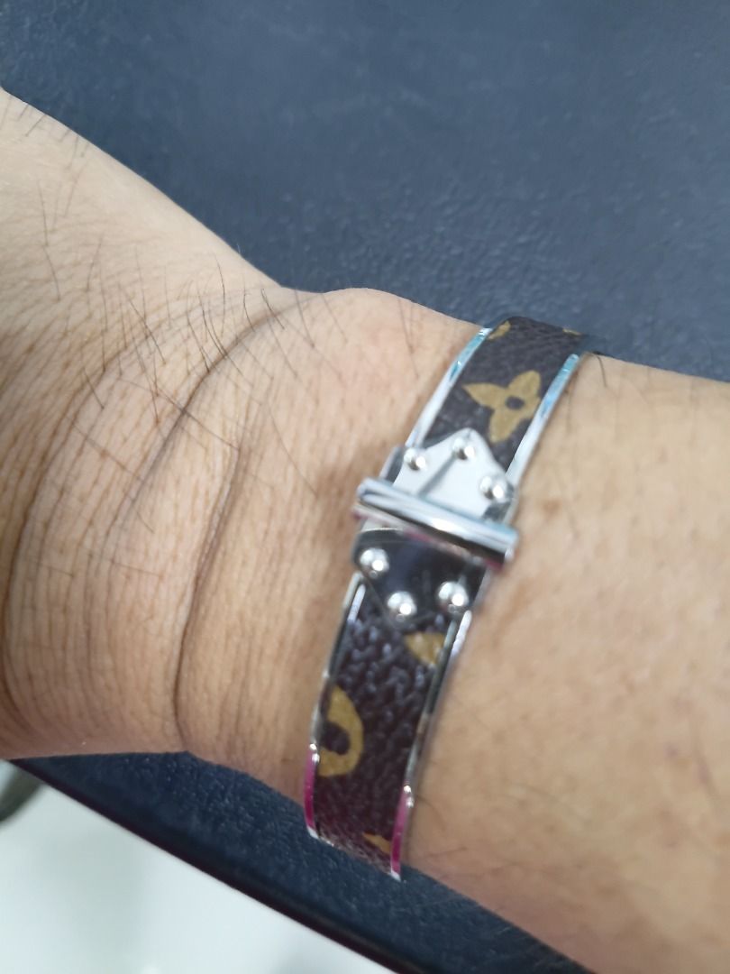 Louis Vuitton Monogram Bracelet (Category: Bracelets) located in Caloocan City. Submitted by harrypotter0215 (Listing ID 1462122782, Image 2). Description: - Classic Louis Vuitton bracelet - Iconic monogram pattern - Silver-tone hardware - Secure buckle closure - Versatile for everyday or special occasions - Measures approximately X cm in circumference.