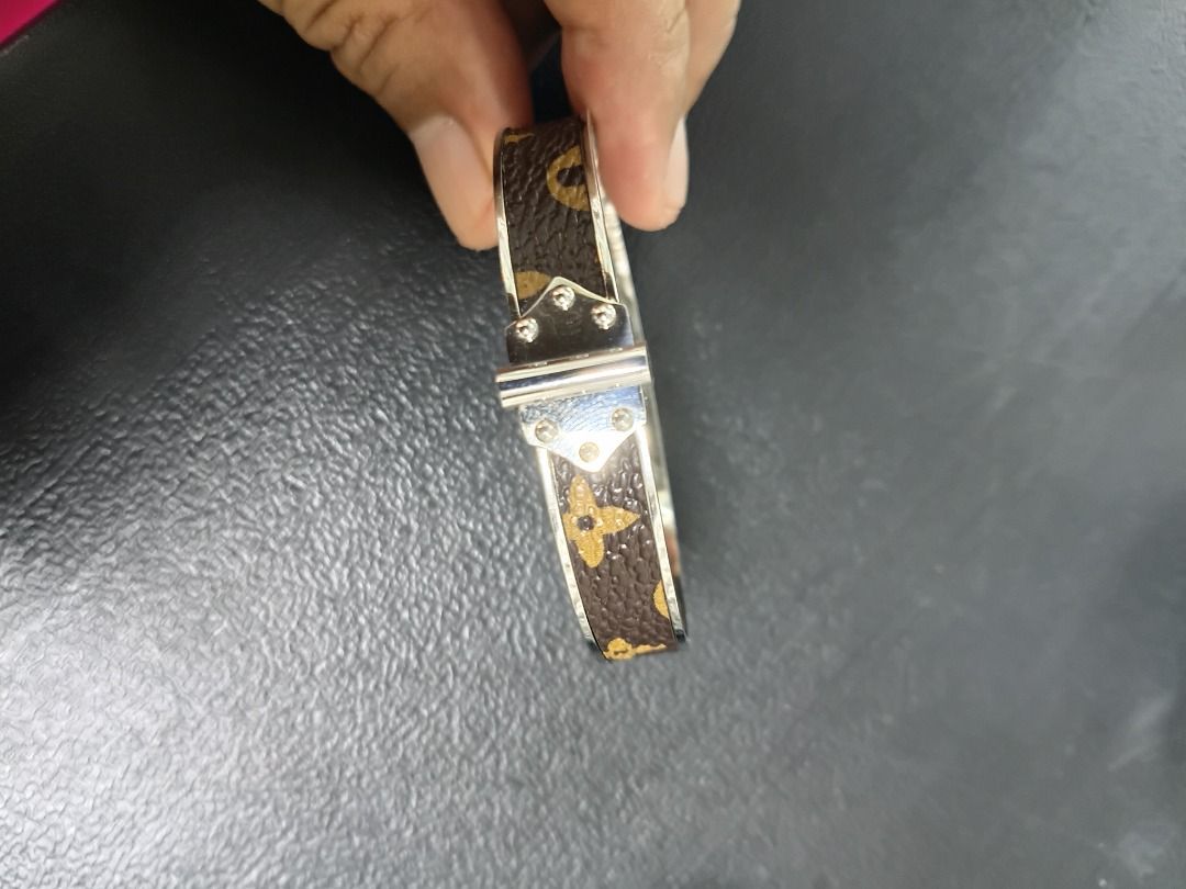 Louis Vuitton Monogram Bracelet (Category: Bracelets) located in Caloocan City. Submitted by harrypotter0215 (Listing ID 1462122782, Image 1). Description: - Classic Louis Vuitton bracelet - Iconic monogram pattern - Silver-tone hardware - Secure buckle closure - Versatile for everyday or special occasions - Measures approximately X cm in circumference.