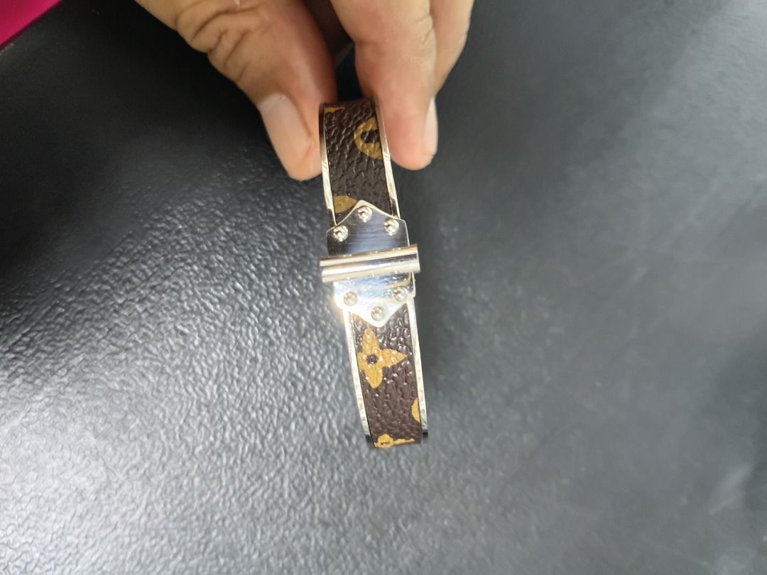 Louis Vuitton Monogram Bracelet (Category: Bracelets) located in Caloocan City. Submitted by harrypotter0215 (Listing ID 1462122782, Image 3). Description: - Classic Louis Vuitton bracelet - Iconic monogram pattern - Silver-tone hardware - Secure buckle closure - Versatile for everyday or special occasions - Measures approximately X cm in circumference.