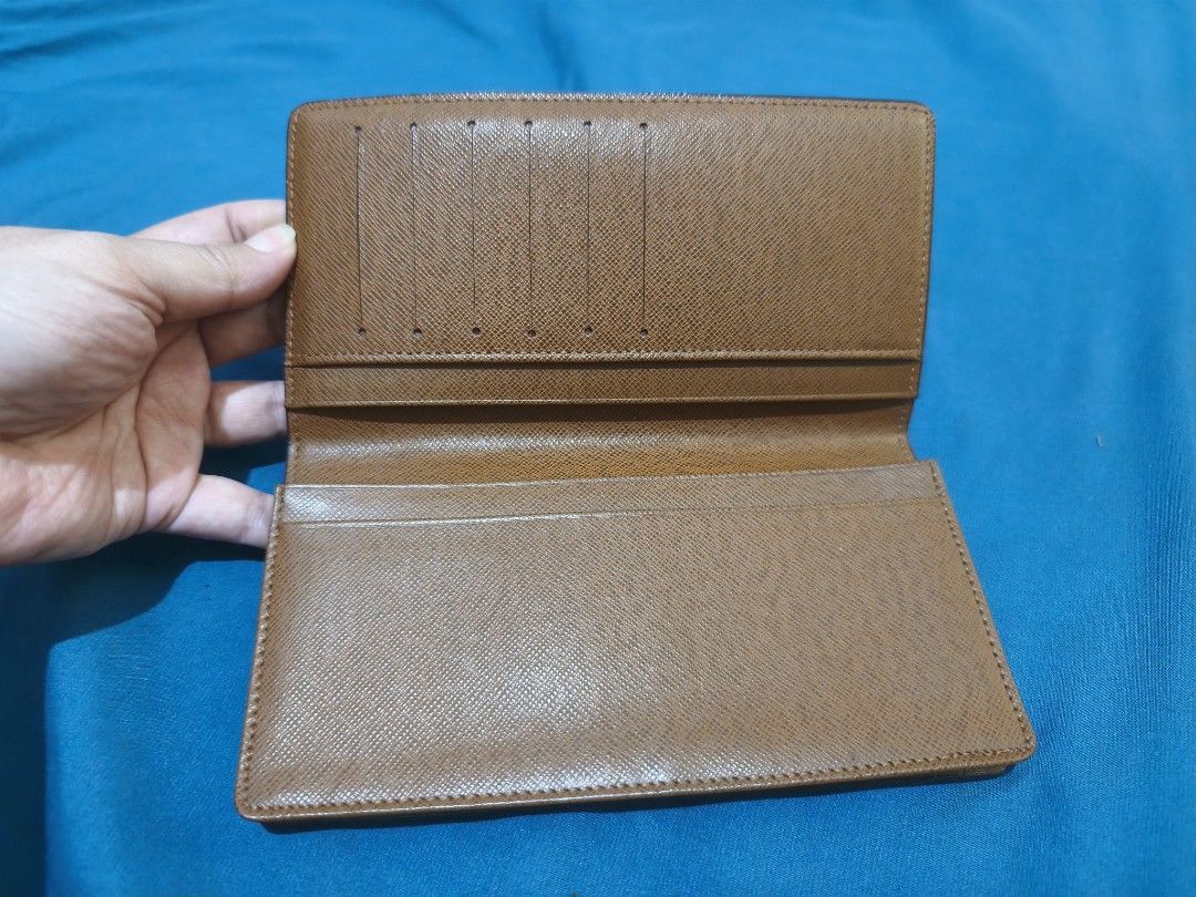 Louis Vuitton Monogram Long Wallet (Category: Luxury Bags & Wallets) located in Quezon City. Submitted by mikmik_ambo (Listing ID 1462169244, Image 3). Description: - Authentic Louis Vuitton Long Wallet - Classic Monogram Canvas Exterior - Brown Leather Interior - Multiple Card Slots for Organization - Serial Number: M64569 -From Japan not ukay.
