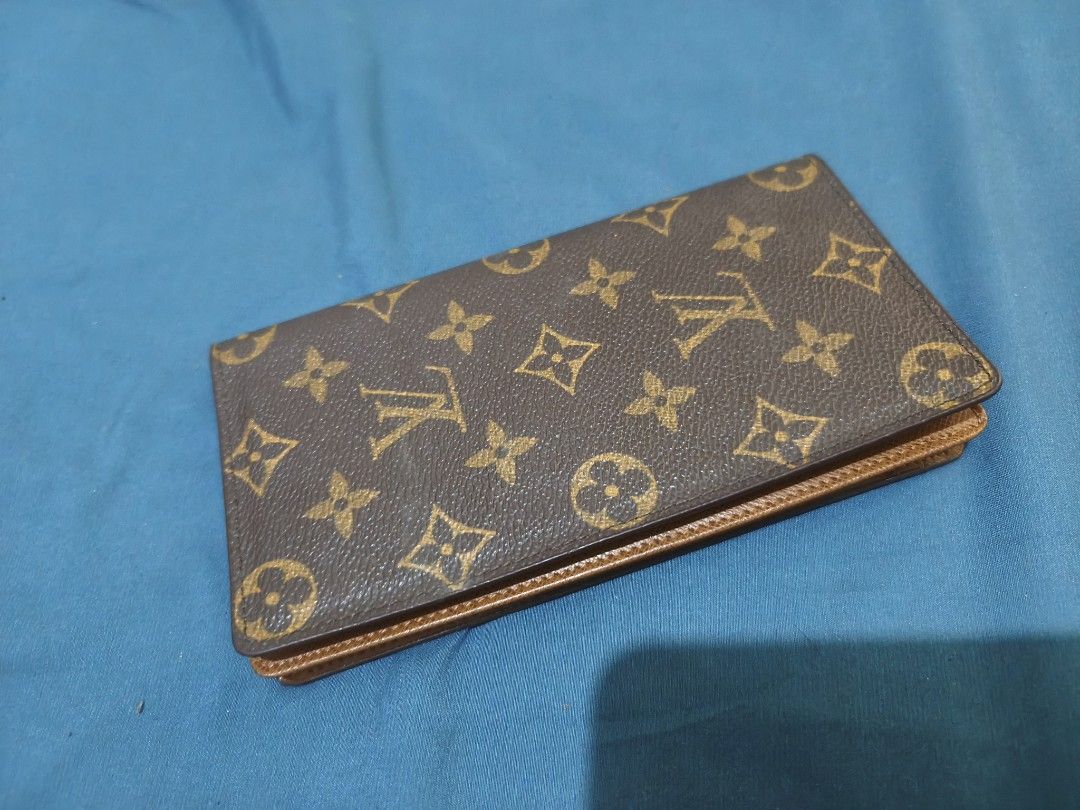 Louis Vuitton Monogram Long Wallet (Category: Luxury Bags & Wallets) located in Quezon City. Submitted by mikmik_ambo (Listing ID 1462169244, Image 1). Description: - Authentic Louis Vuitton Long Wallet - Classic Monogram Canvas Exterior - Brown Leather Interior - Multiple Card Slots for Organization - Serial Number: M64569 -From Japan not ukay.