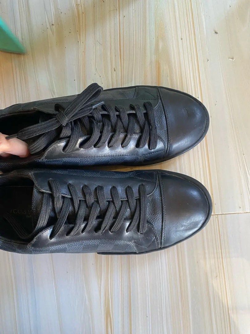 Louis Vuitton Monogram Sneakers (Category: Sneakers & Footwear) located in Manila. Submitted by bryque (Listing ID 1462044659, Image 2). Description: - Authentic Louis Vuitton Monogram Sneakers - Classic black monogram pattern on sides - Durable leather toe cap - Secure lace-up closure - Rubber sole with iconic LV logo detail - Expertly crafted in Italy - Ideal for stylish everyday wear PM for video.