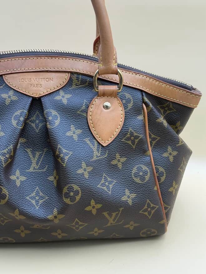 Louis Vuitton Monogram tivoli pm Bag (Category: Luxury Bags & Wallets) located in Pasay City. Submitted by fashion_islife12 (Listing ID 1462111673, Image 2). Description: - Authentic Louis Vuitton Monogram tivoli pm Bag - Made in France - Classic LV Monogram Canvas - Vachetta Leather Trim and Handles - Multiple Interior Pockets - Includes Dust Bag and Authenticity Card - Date Code: VI1151 - Ideal for Everyday Use With authentication.