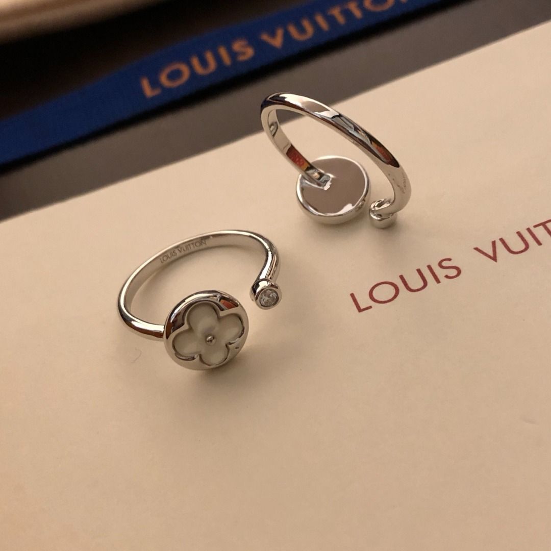 Louis Vuitton Silver Ring with Clover Motif (Category: Rings) located in Pateros City. Submitted by silvercat-dab8ef (Listing ID 1462132617, Image 2). Description: - Authentic Louis Vuitton silver ring - Features a white clover motif - Accented with a small diamond - Comes with original LV box, dust bag, and shopping bag - Ideal for gifting or personal collection.