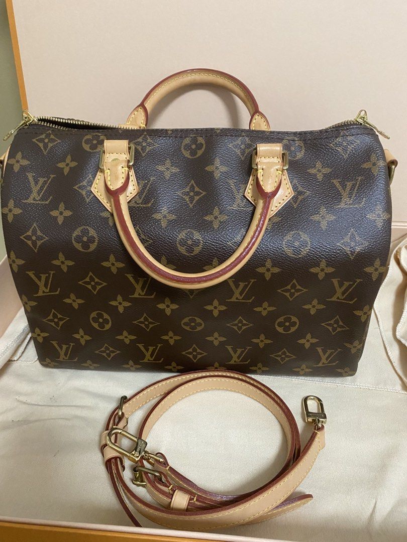 Louis Vuitton Speedy 30 Monogram Canvas Bag (Category: Luxury Bags & Wallets) located in Agdangan. Submitted by aikara683 (Listing ID 1462052291, Image 3). Description: - Classic Louis Vuitton Speedy bag in iconic monogram canvas. - Comes with original box and dust bag for safekeeping. - Includes detachable shoulder strap for versatile carrying options. - Elegant gold hardware details add a touch of luxury. - Secure zipper closure ensures your be