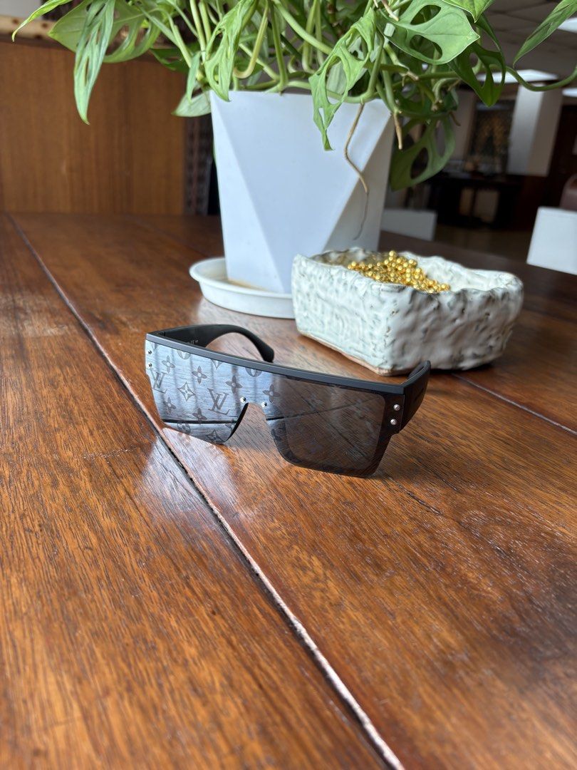 Louis Vuitton Waimea Large Square Sunglasses (Category: Sunglasses & Eyewear) located in Manila. Submitted by kevs122 (Listing ID 1462092154, Image 2). Description: Retail price ₱34,500 Now only ₱15,000 - Authentic Louis Vuitton Waimea Large Square sunglasses - Stylish black frame - Features iconic LV monogram lenses - Includes original packaging - Ideal for sunny weather.