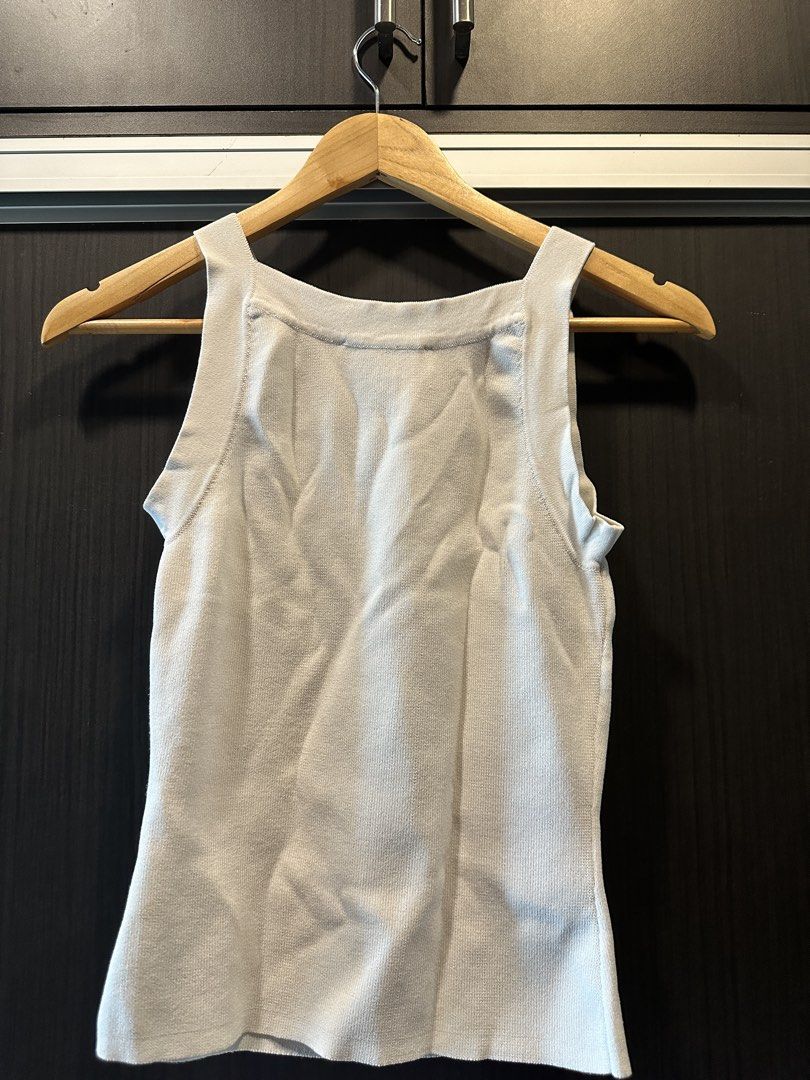 Love Bonito White Ribbed Tank Top (Category: Sleeveless) located in Manila. Submitted by cnik8 (Listing ID 1462109631, Image 2). Description: - Brand: Love, Bonito - Color: White - Material: Ribbed fabric - Neckline: Square - Straps: Thick -Sleeveless.