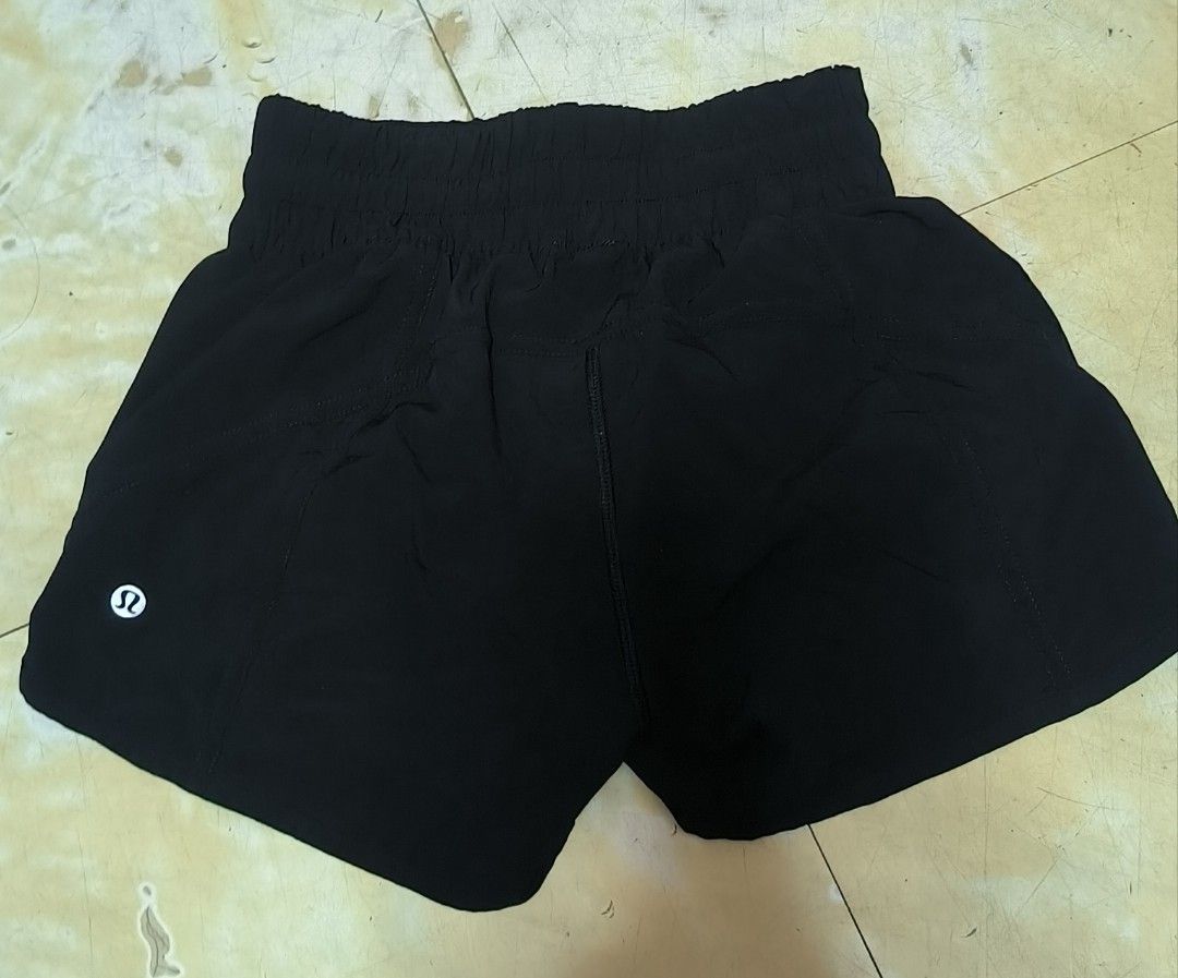 Lululemon Black Shorts Size 2 (Category: Activewear) located in Manila. Submitted by itsmelawrence (Listing ID 1462204541, Image 1). Description: - Brand: Lululemon - Color: Black - Size: 2 - Made in: Bangladesh - Fabric Composition: 86% recycled polyester, 14% elastane (body) - Inner Waistband: 87% nylon, 13% Lycra elastane - Liner: 89% polyester, 11% elastane - Features: Zippered pocket for secure storage.