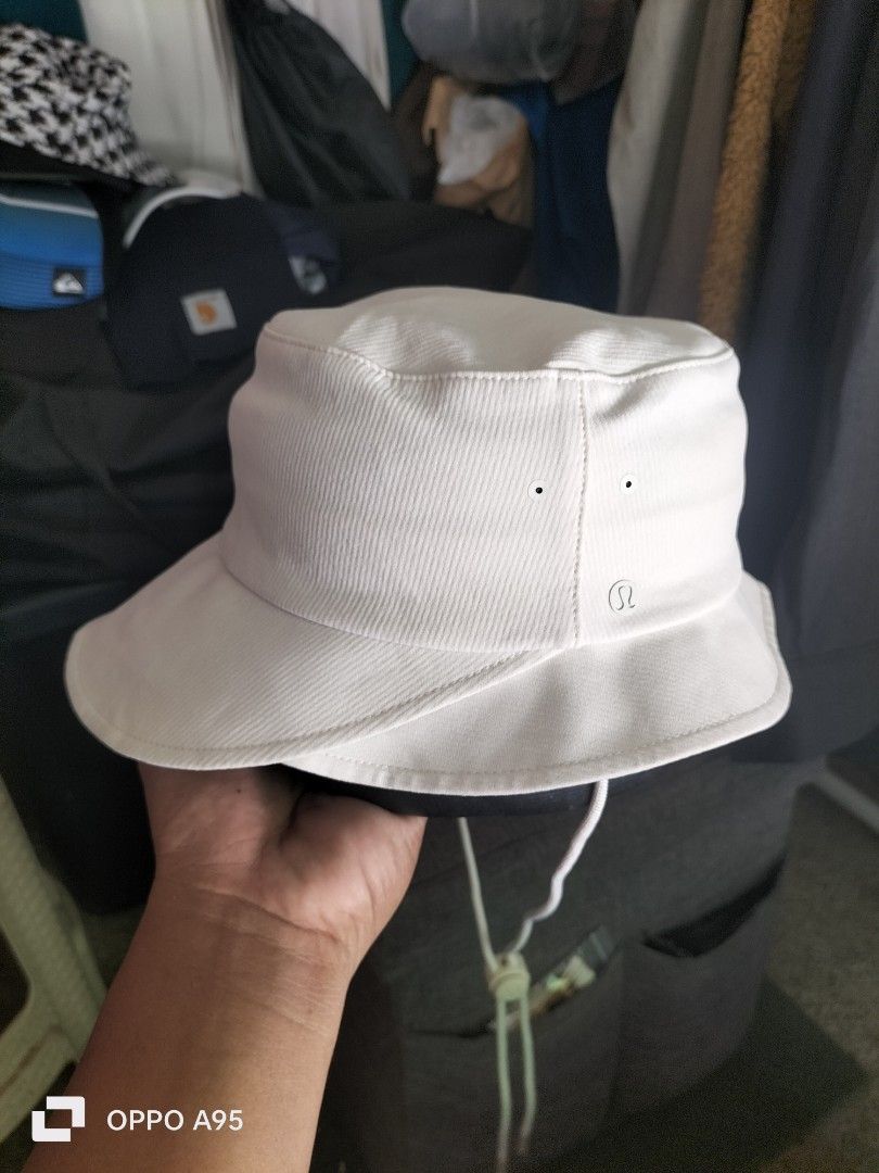 Lululemon Bucket Hat White XS/S (Category: Hats & Beanies) located in Baler. Submitted by jaydeebaltazar (Listing ID 1462162993, Image 2). Description: - White Lululemon bucket hat - Size: XS/S - Material: Nylon & Elastane blend - Features: Adjustable drawstring with toggle - Condition: Clean and well-maintained - Perfect for: Sunny days, casual wear.