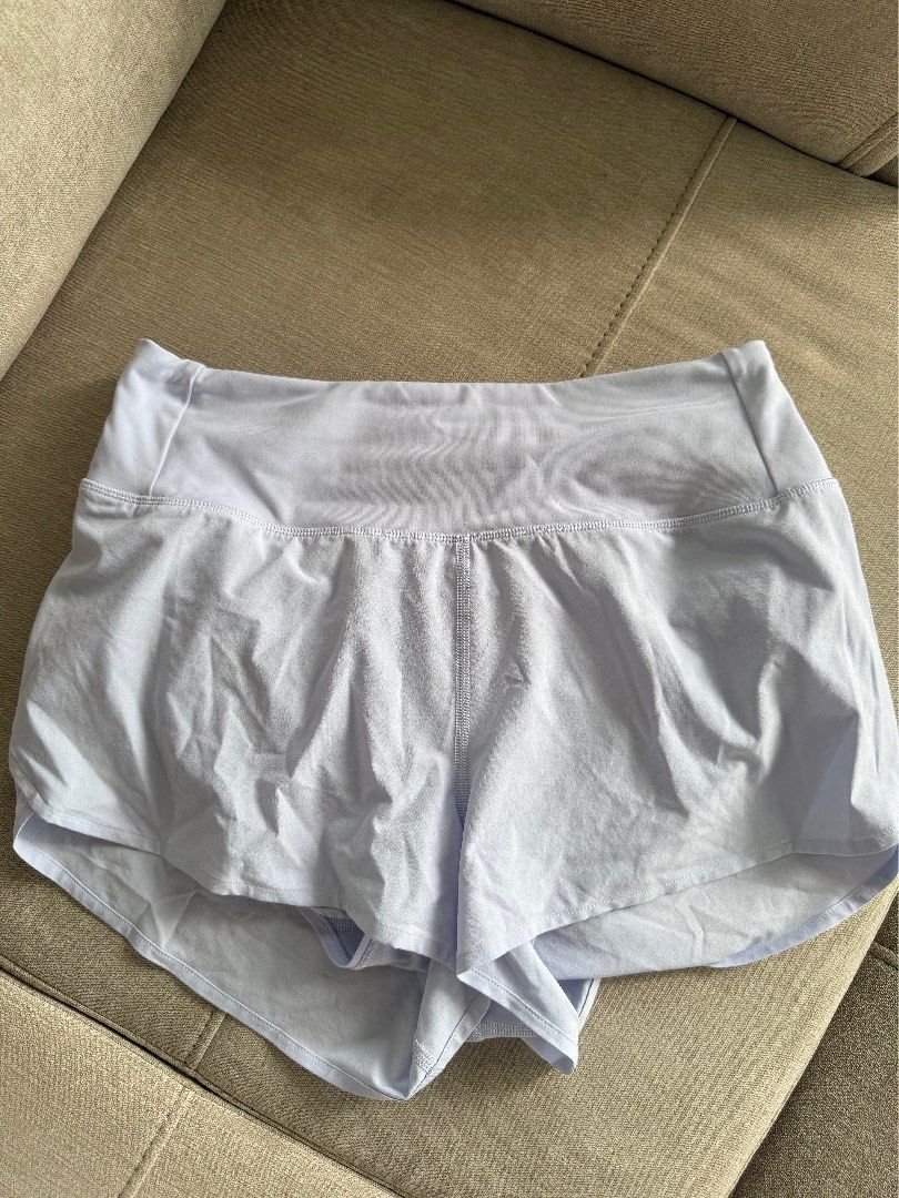 Lululemon Speed Up Shorts 2.5” (Category: Activewear) located in Davao. Submitted by friesflakes (Listing ID 1462065572, Image 2). Description: 1800 each - Size: 2 (XS) - Colors: Light Blue and White - Features: Built-in liner, zippered back pocket - Ideal for running, workouts, and active wear.