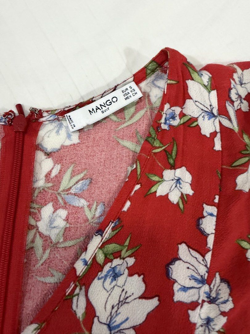 Mango Floral Romper (Category: Dresses) located in Quezon City. Submitted by ayybee_closet (Listing ID 1462114733, Image 2). Description: - Used a few times but like new. No damages - Romper that flows like a dress - Soft chiffon fabric w tie waist design - Convenient zipper closure at the back..