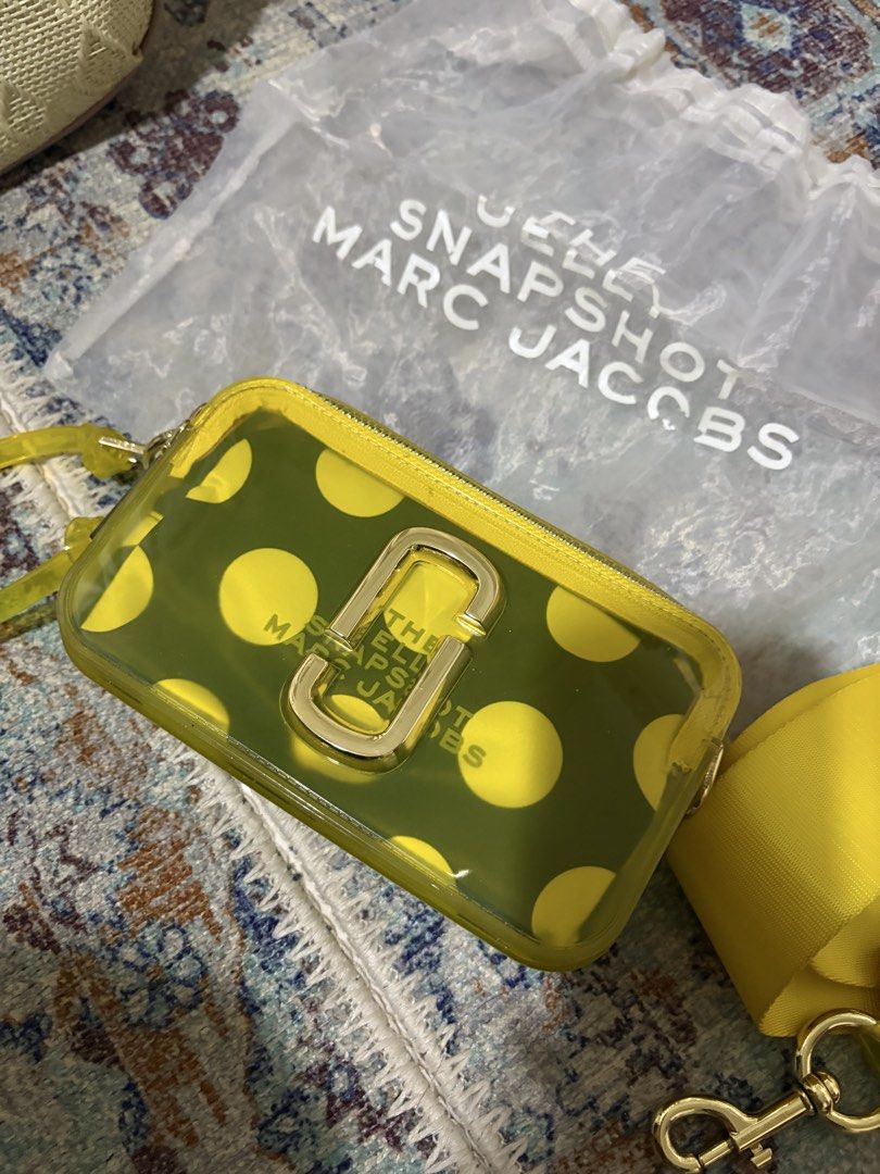 Marc jacobs neon yellow camera snapshot bag (Category: Cross-body Bags) located in Manila. Submitted by declutter_diariess (Listing ID 1462163540, Image 2). Description: Fixed price Jelly line Comes with original dust bag.