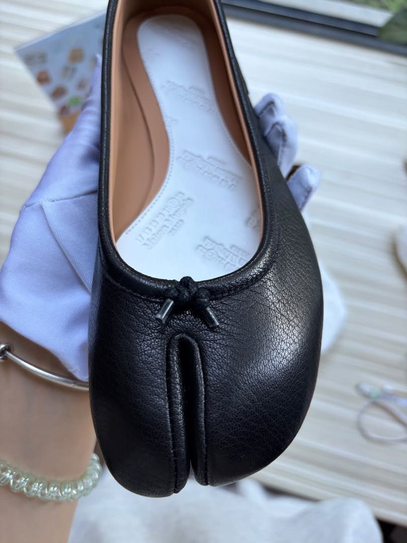 Margiela Tabi Real Leather Dupes (Category: Flats & Sandals) located in Paranaque City. Submitted by clean.closetx (Listing ID 1462038206, Image 2). Description: These are not authentic but not noticeable unless you look at it close up. Leather is real and looks well made. Selling it for the same price I got it from supplier. Rfs: decided to buy authentic Size 38 or US 7.